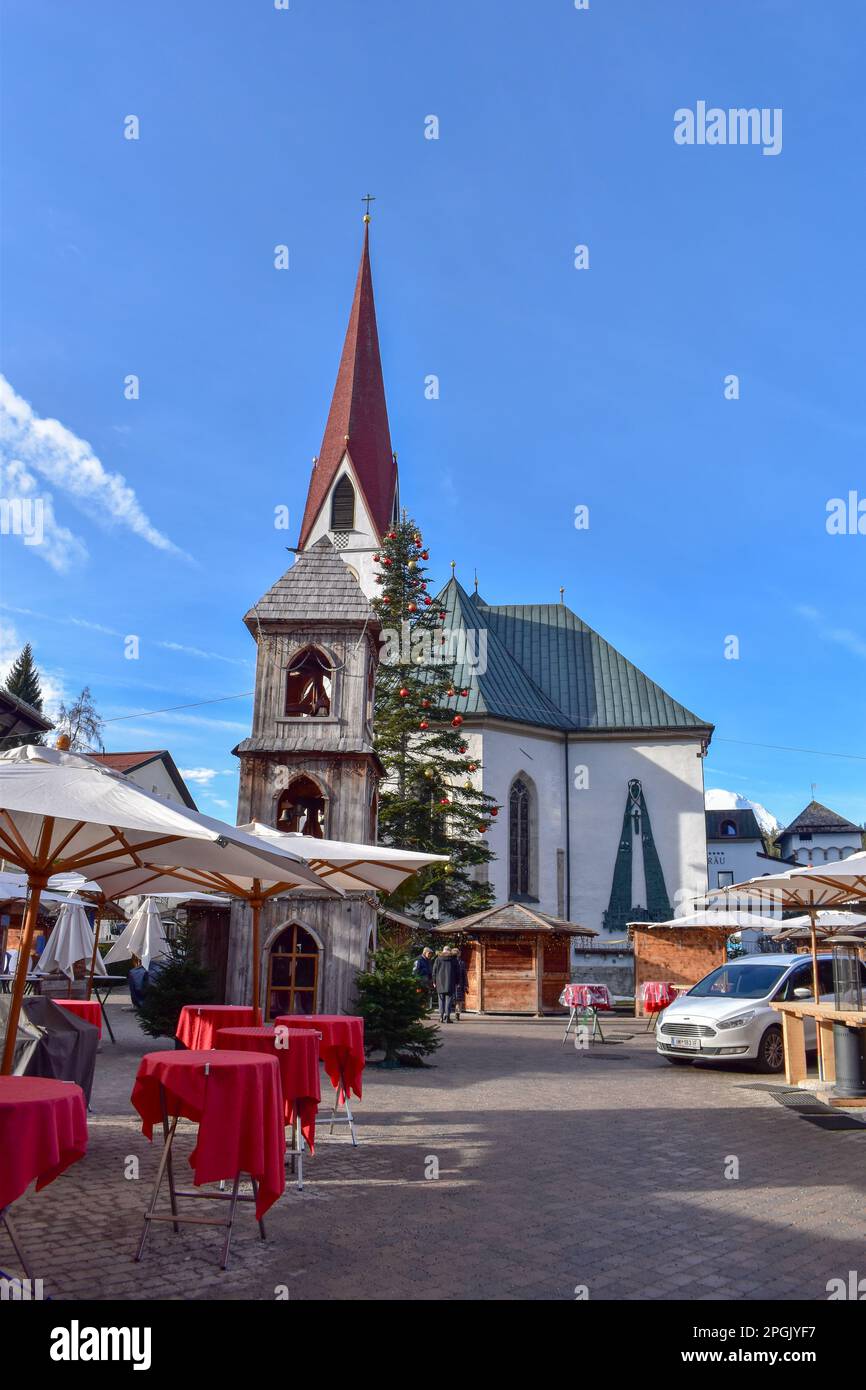 Seekirche (Heiligkreuzkirche) in Seefeld, Tirol, Austria. At the Town Square. Stock Photo