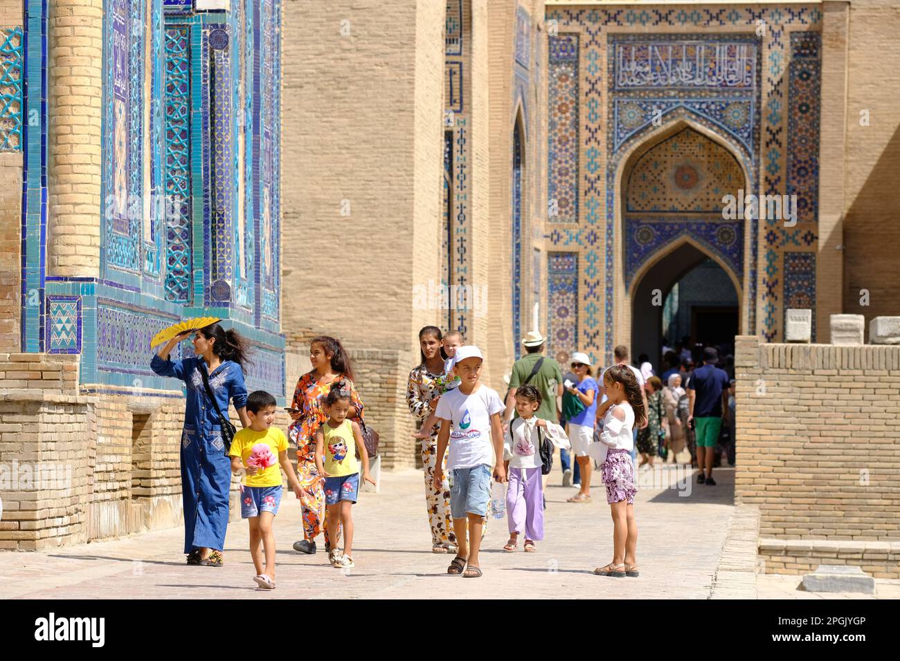 Samarkand Uzbekistan visitors at the Shahi Zinda ( Shah i Zinda ) ancient tomb and mausoleum complex in August 2022 Stock Photo