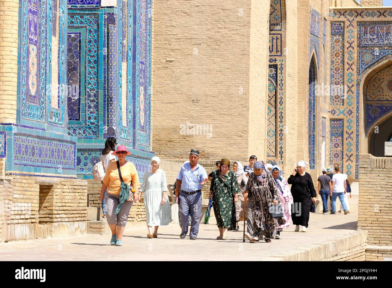 Samarkand Uzbekistan visitors at the Shahi Zinda ( Shah i Zinda ) ancient tomb and mausoleum complex in August 2022 Stock Photo