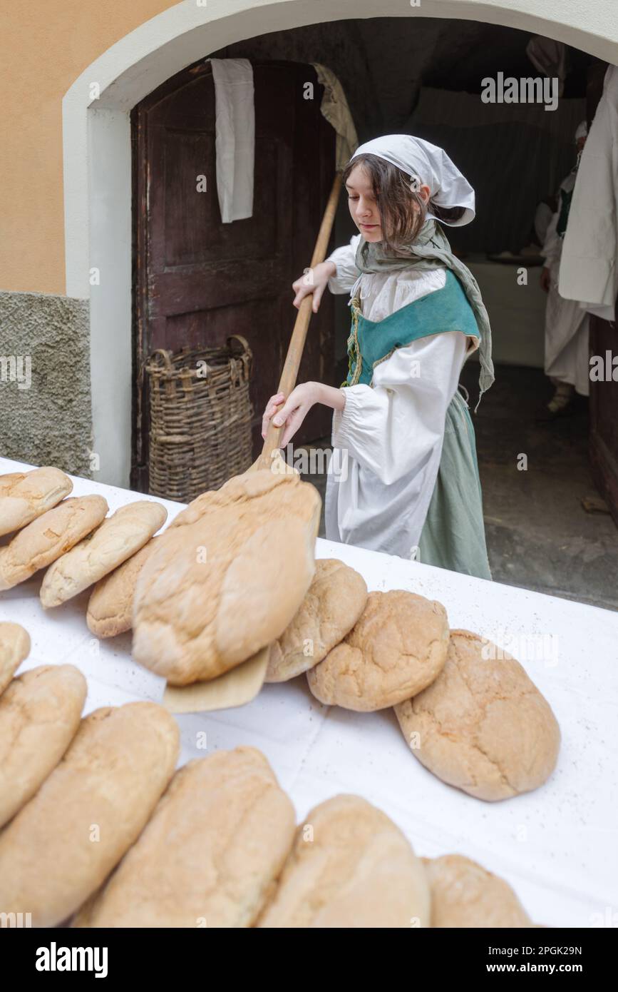 Participant of historical reenactment in the old town of Taggia, Liguria region of Italy Stock Photo