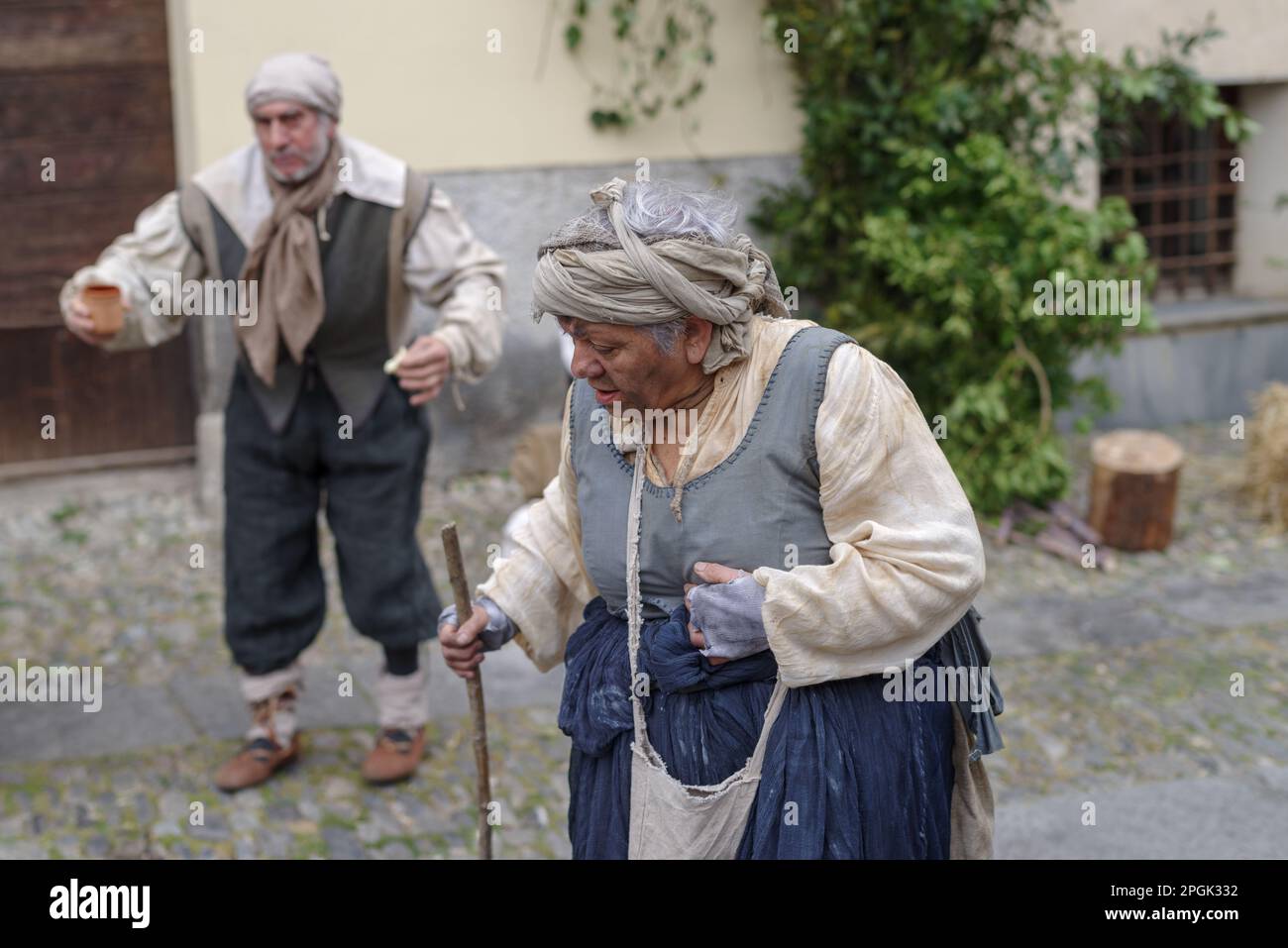 Participants of historical reenactment in the old town of Taggia, in Liguria region of Italy Stock Photo