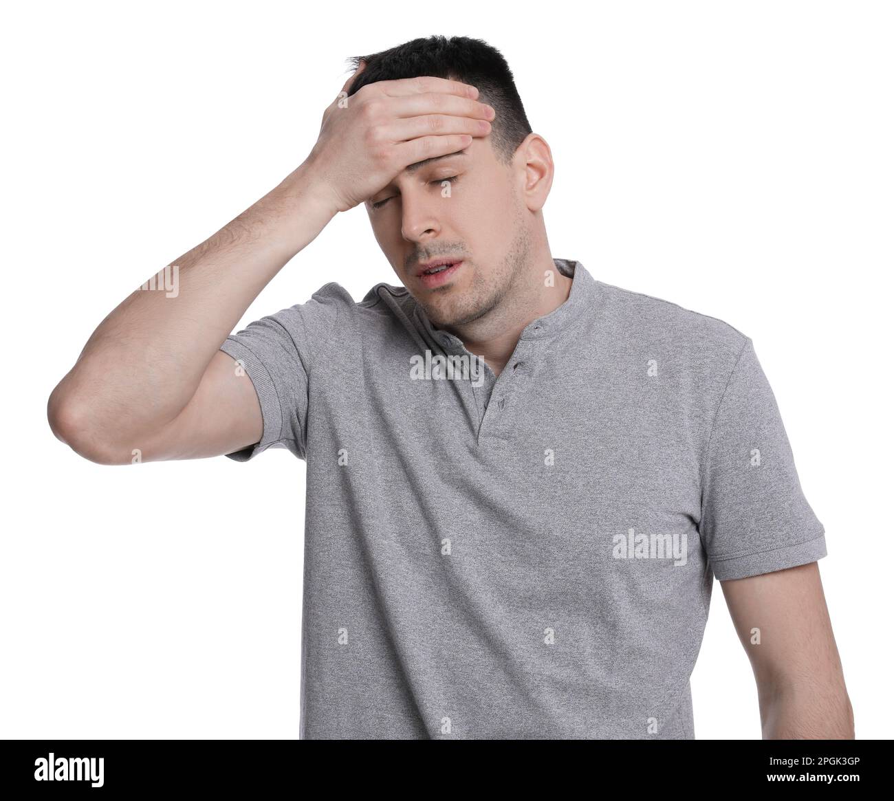 Cold Hadeche Young man suffering from headache on white background. Cold symptoms ...