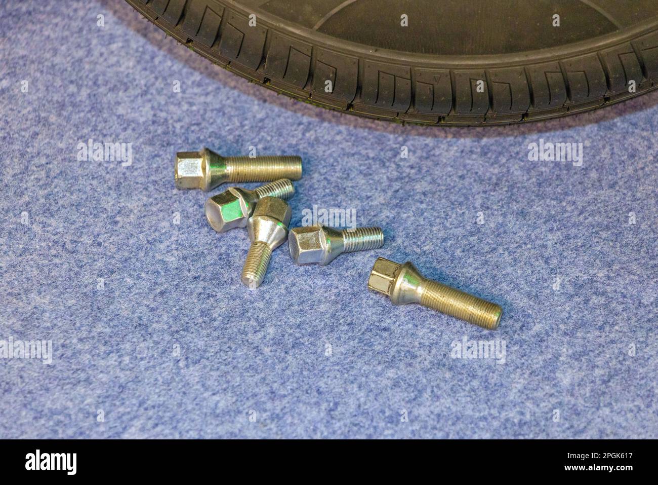 Set of Five Bolts for Tyre Wheels at Floor Stock Photo Alamy