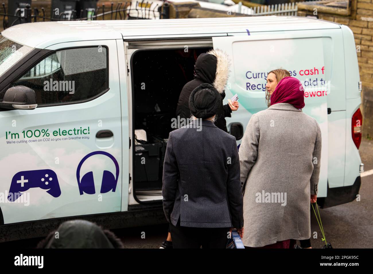 EDITORIAL USE ONLY An electric van collects old and unwanted tech from