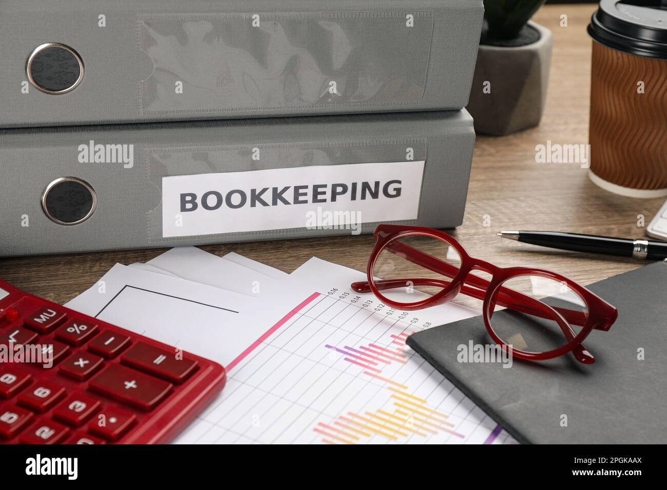 Bookkeeper's workplace with folders and documents on table Stock Photo