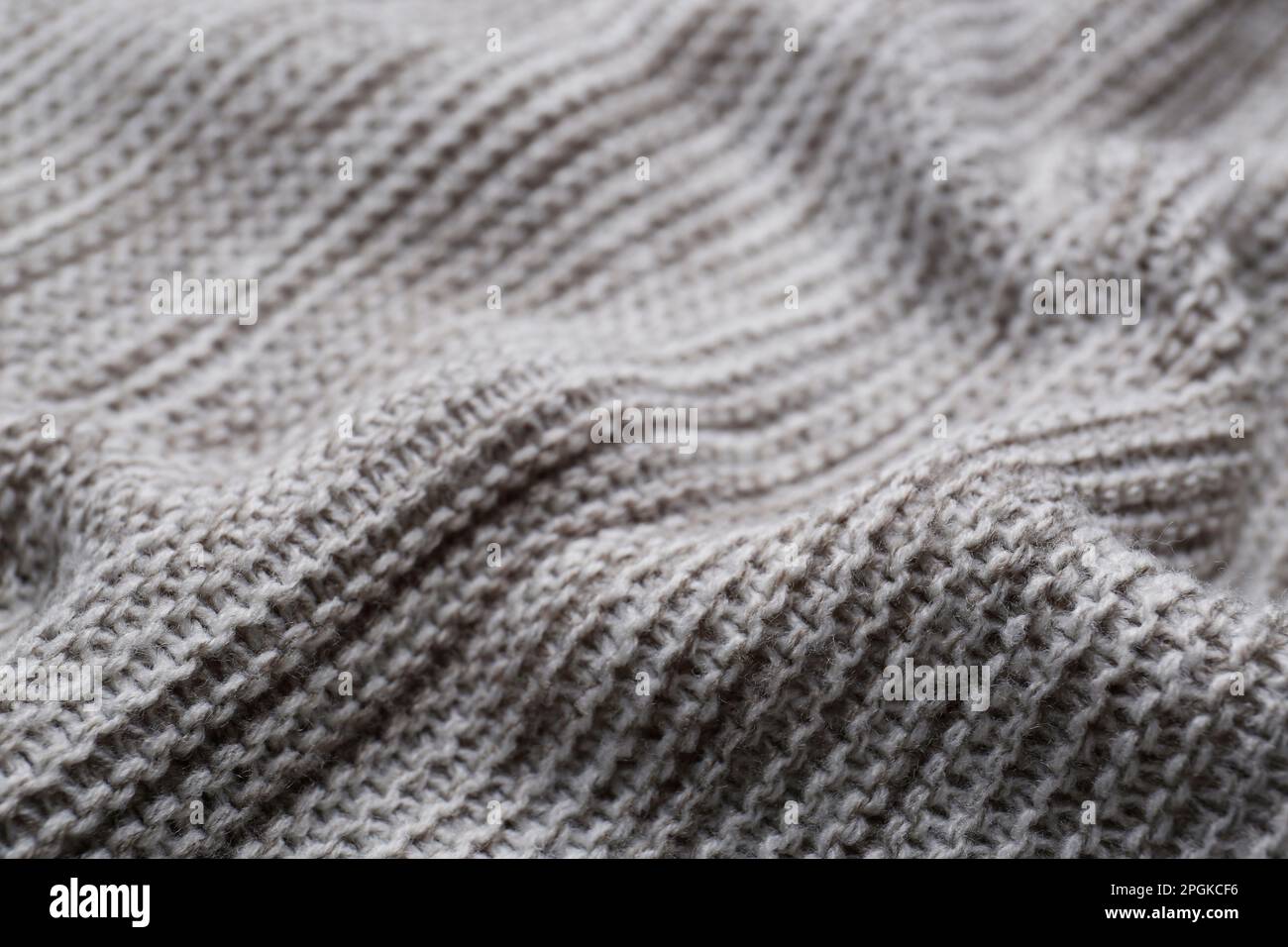 Grey knitted fabric hi-res stock photography and images - Alamy