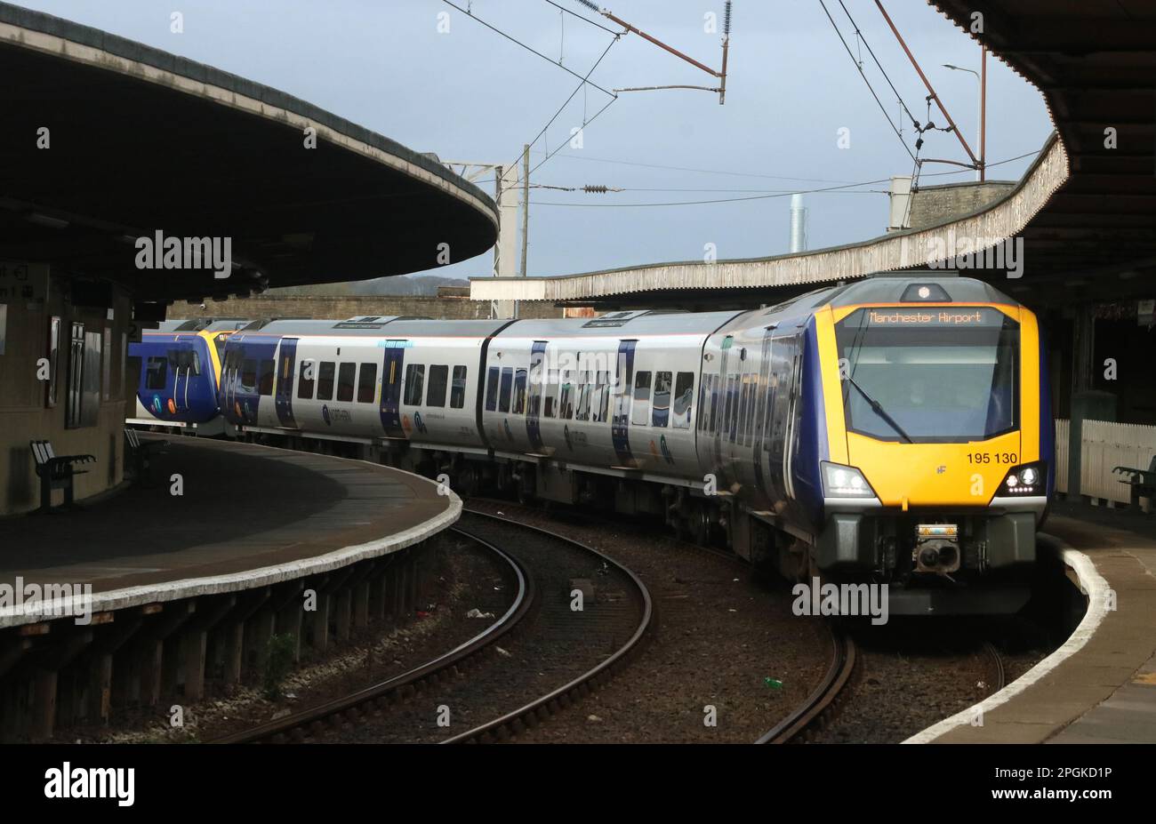 Northern trains Civity class 195 dmus, 195130 and 195107 arriving at Carnforth station platform