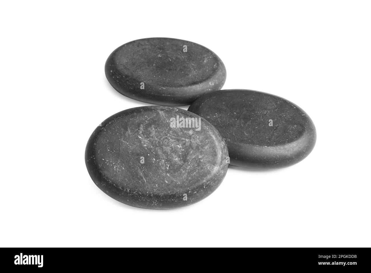 Group of black stones on white background Stock Photo Alamy
