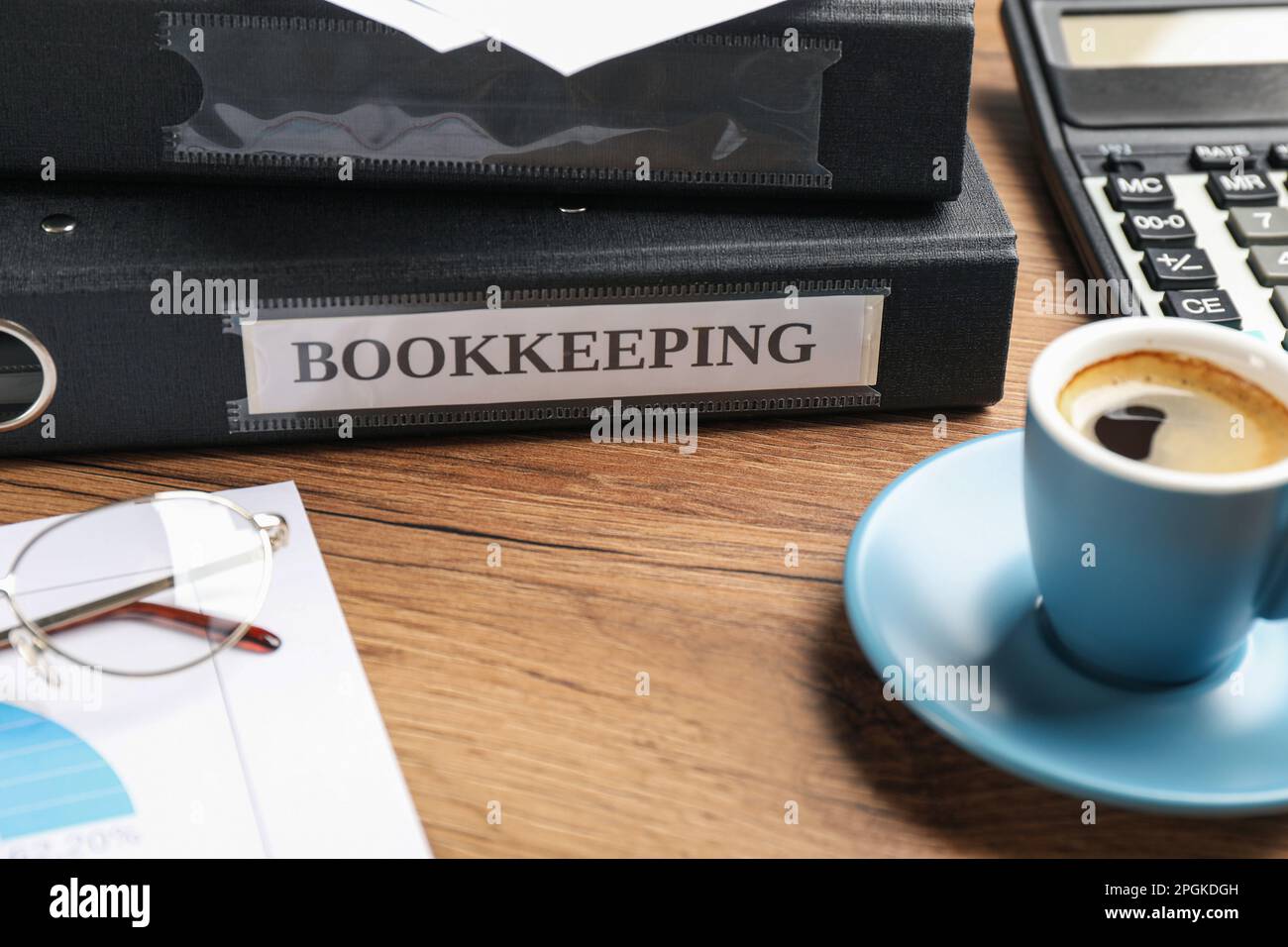 Bookkeeper's workplace with folders and documents on table Stock Photo