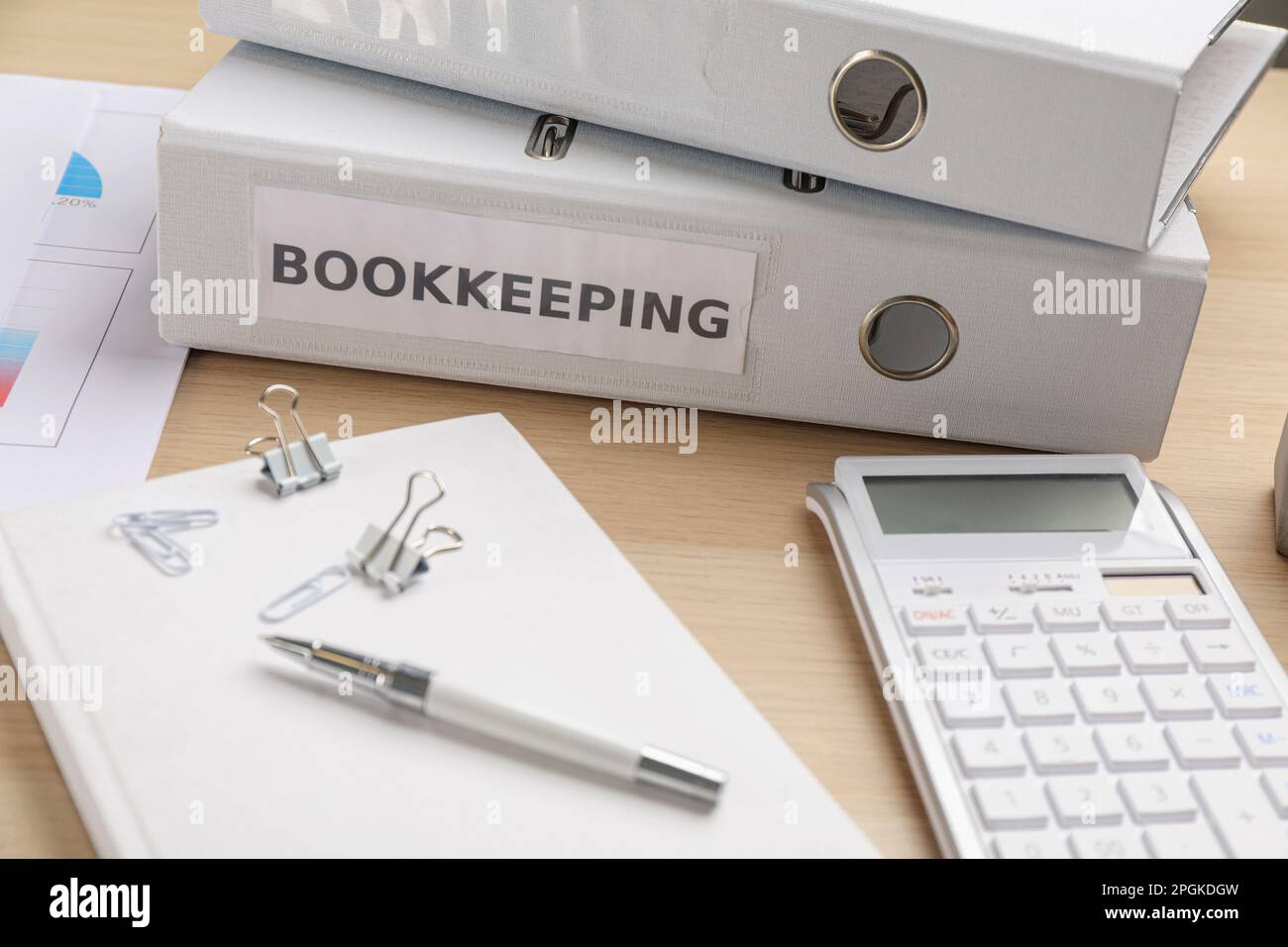 Bookkeeper's workplace with folders and documents on table Stock Photo