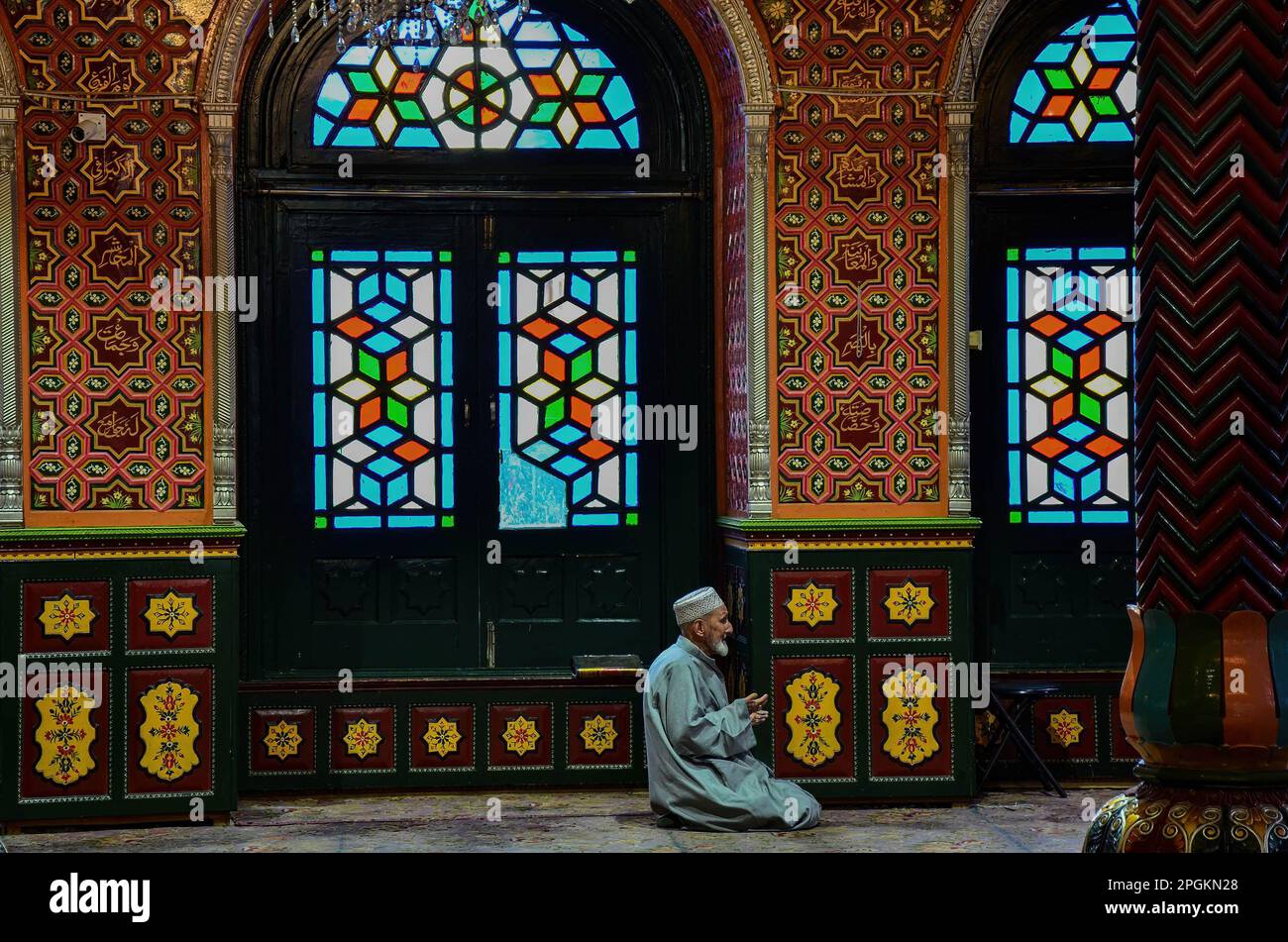 Srinagar, India. 23rd Mar, 2023. A Kashmiri Muslim devotee prays inside ...