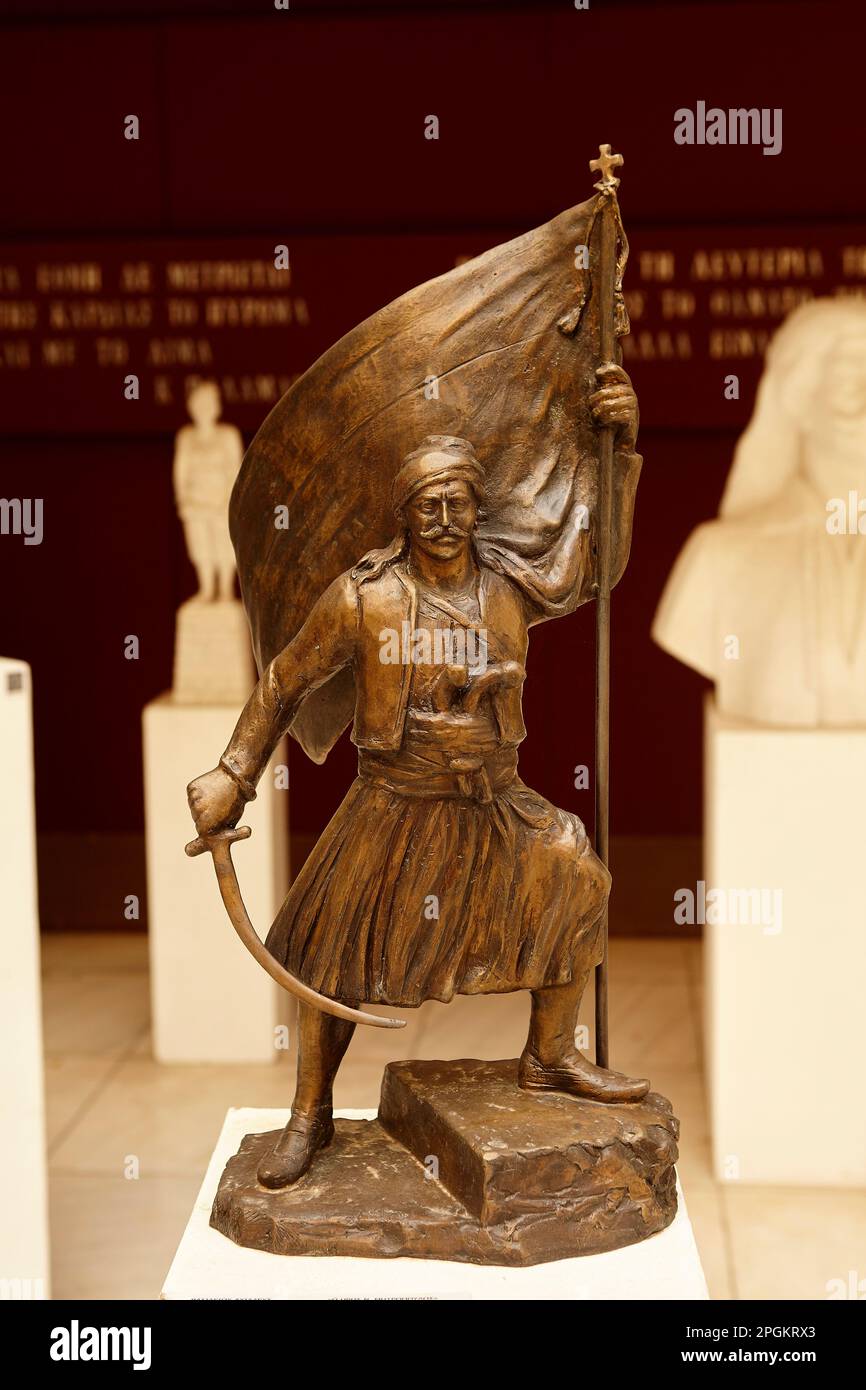 Greek insurrection flag, 1821. Statue at Athens War Museum Stock Photo