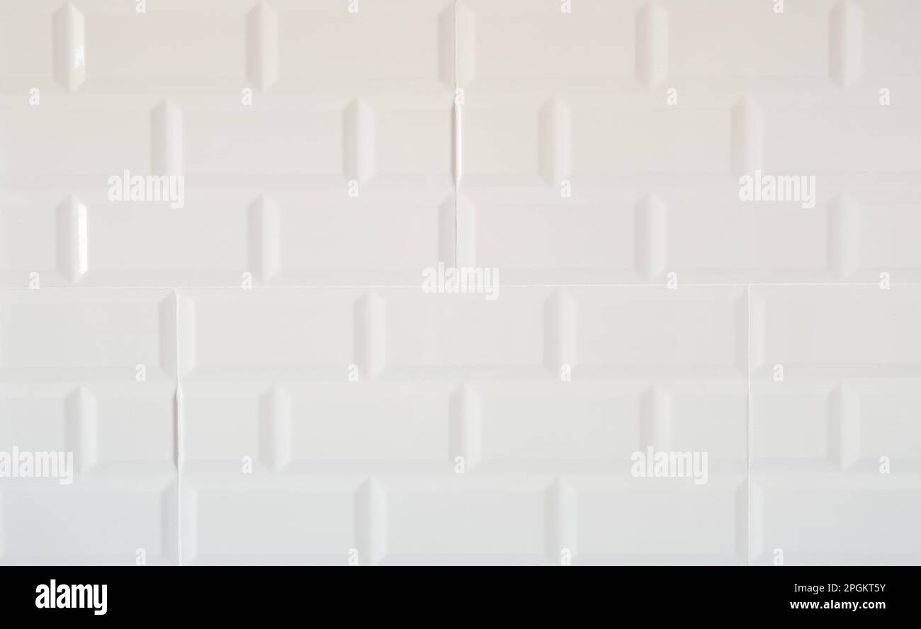 White ceramic tiles on the wall Stock Photo Alamy