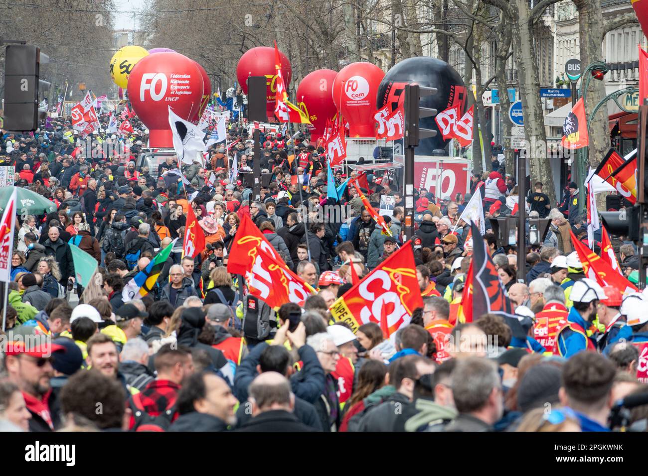 Paris, France, 23th March, 2023. Unionized workers protest with flags against pension reform - Jacques Julien/Alamy Live News Stock Photo