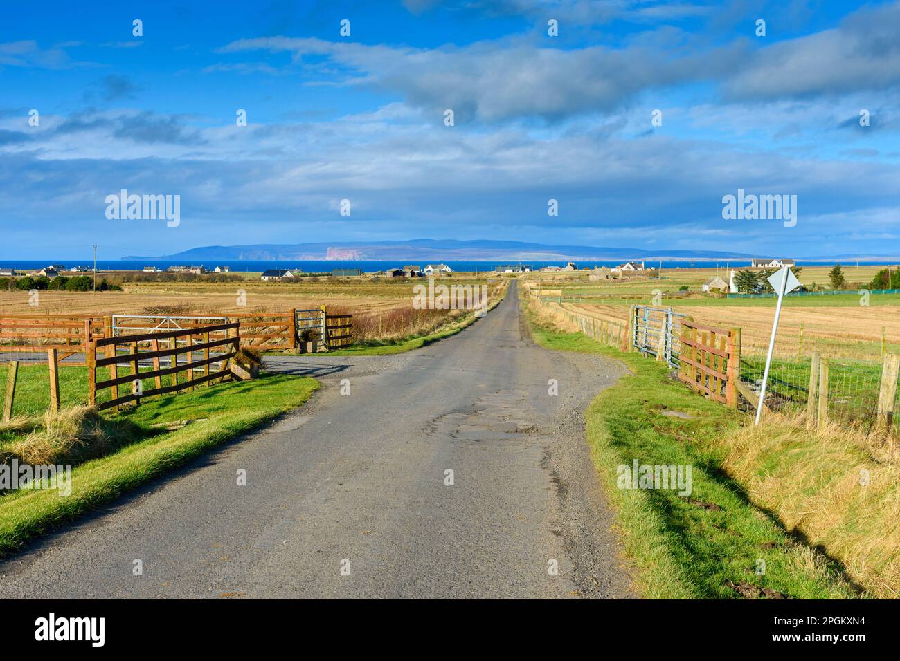 The island of Hoy, Orkney, over the Pentland Firth, from the road to Skarfskerry, near the village of Mey, Caithness, Scotland, UK Stock Photo