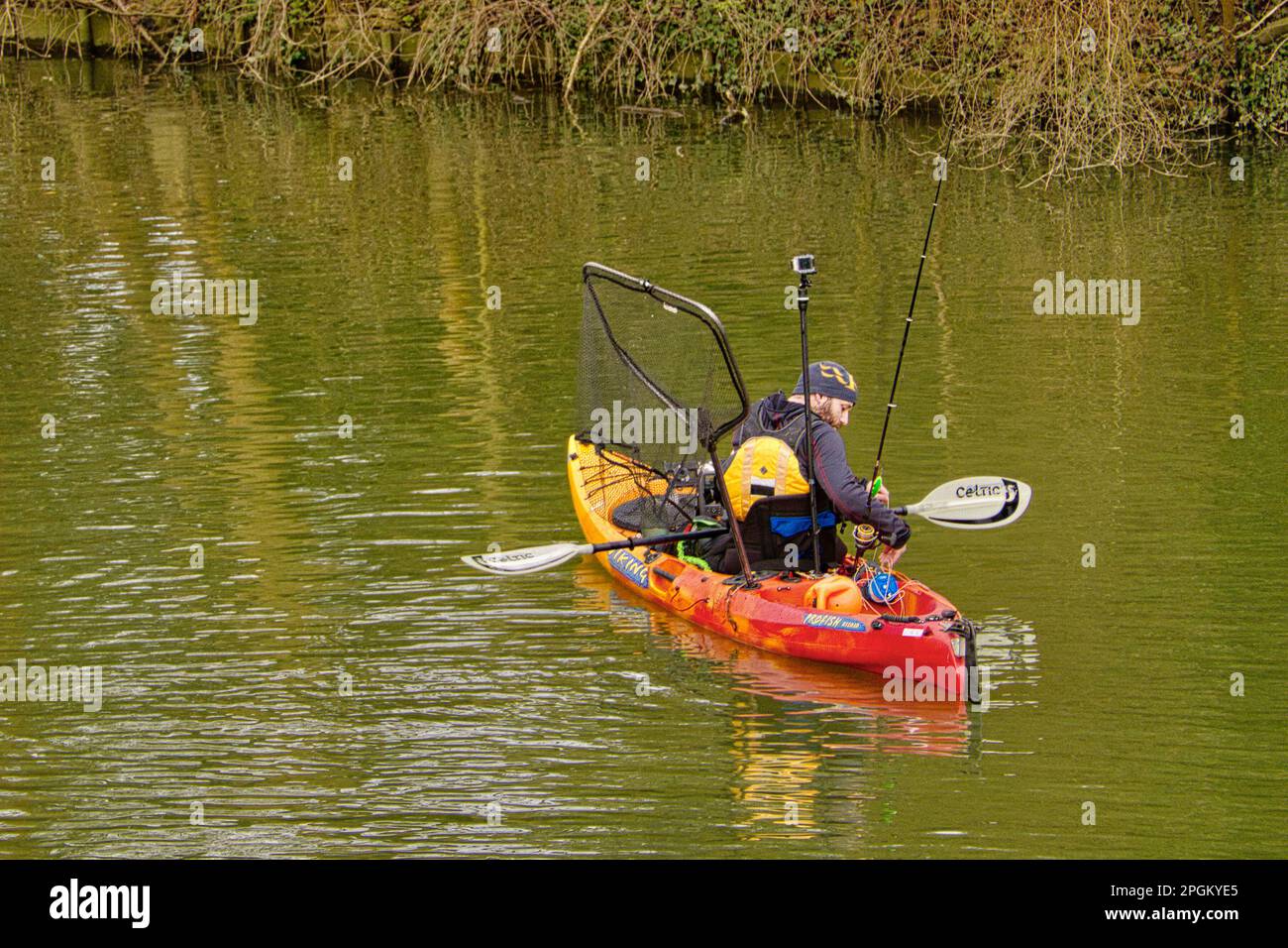 Fisherman In A Boat, River Thames Stock Photo
