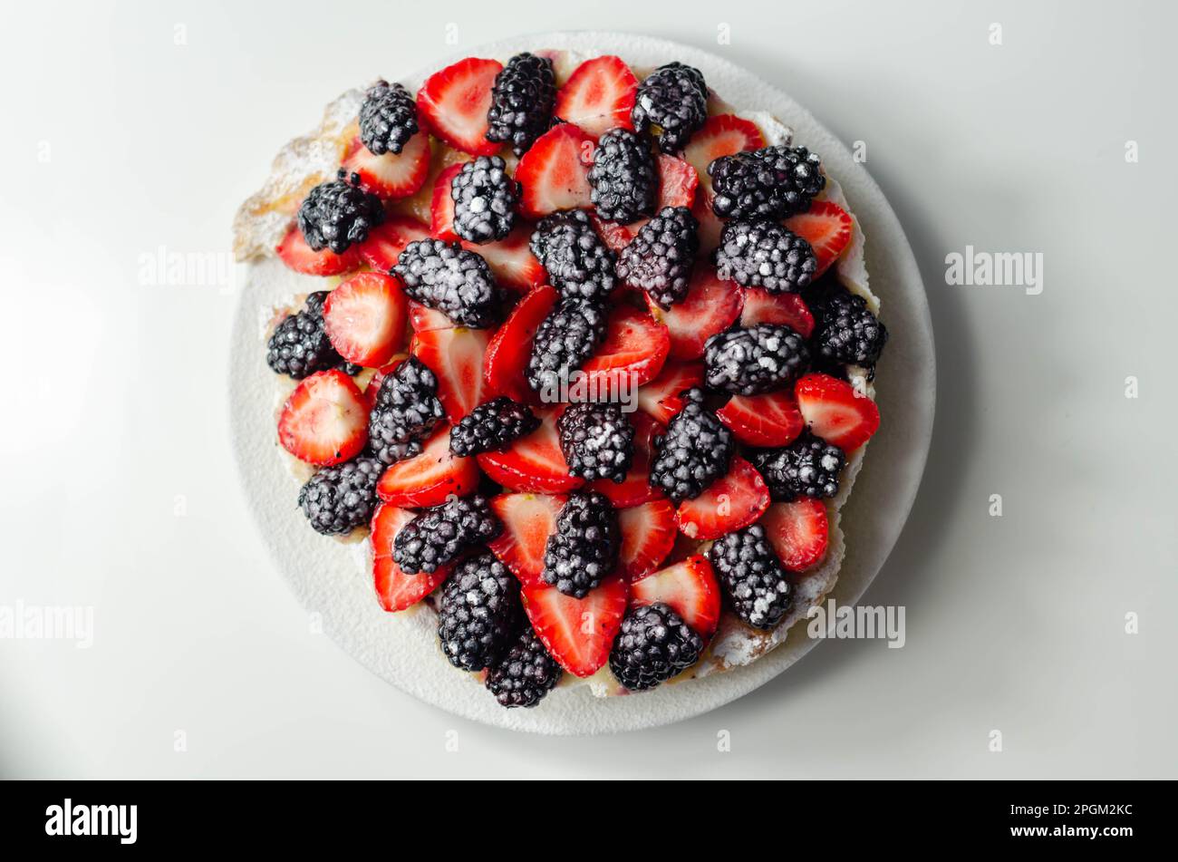 Butter enriched shortcrust pastry topped strawberries and blackberries