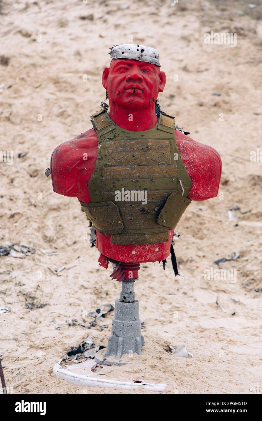 Dummy in body armor shot through with firearm at training shooting