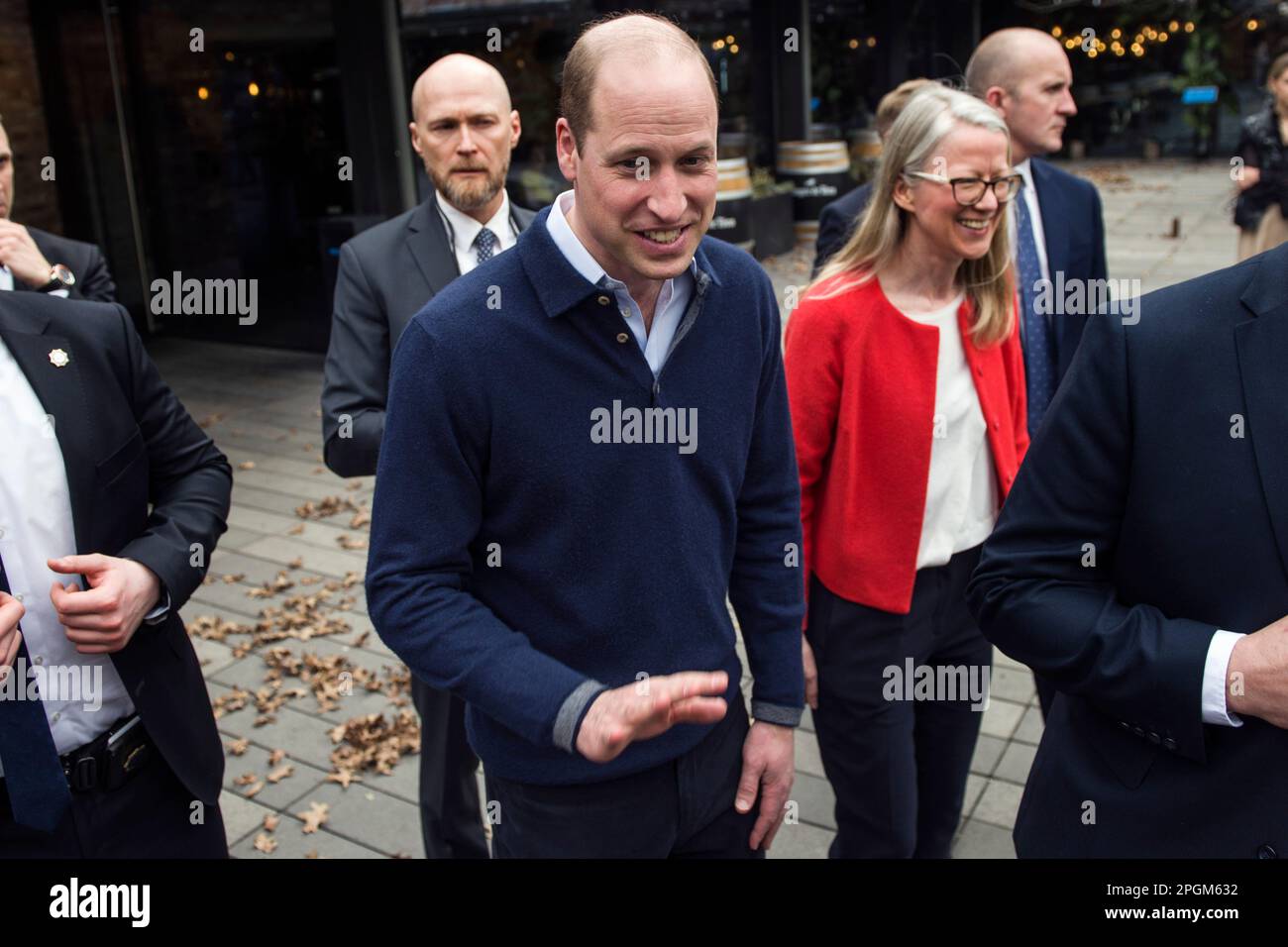 Prince William greets and talks to Ukrainians and his Polish fans during his visit in Warsaw. Britain's Prince William has made unannounced two-day visit to Poland that has been kept tightly under wraps due to security. During his visit, the Prince of Wales visited the British and Polish troops stationed next to the Ukrainian border, also met with Ukrainian refugees sheltering in Warsaw. On the second day of his visit Prince William talked to President Andrzej Duda at the presidential palace. In the final stop on his two-day visit, William went to a trendy food hall where he met with young Ukr Stock Photo