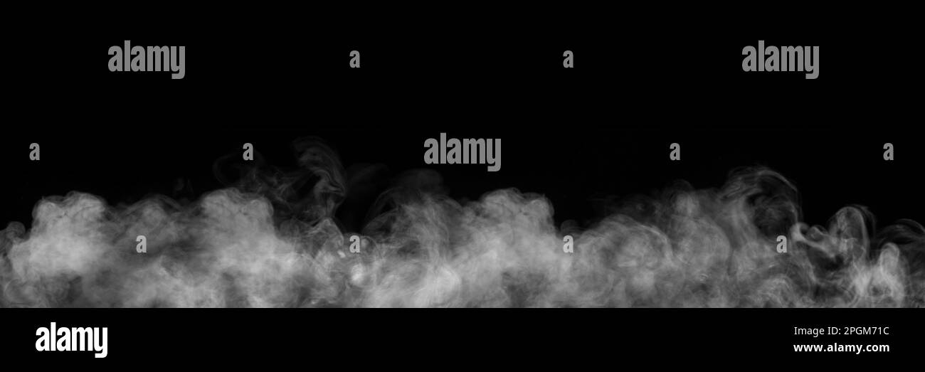 White horizontal smoke on black background. Monochrome, grayscale photography of illuminated incense. Moody feeling. Dark backdrop, graphic resource f Stock Photo