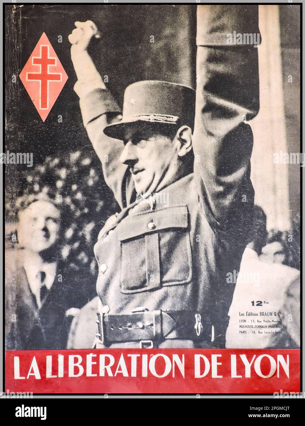 WW2 LYON France French Liberation General De Gaulle in uniform celebrates 'LA LIBERATION DE LYON' in Southern France, from the occupation of Nazi Germany. Emblem of The Cross of Lorraine the symbol of Free  France during World War II  is printed on this magazine front cover priced at 12 frs. Stock Photo