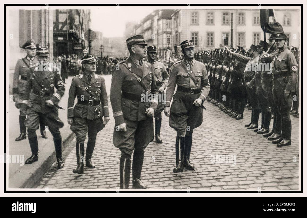 1930s Karl Ernst inpects a parade of Sturmabteilung at a Nazi Parade KARL ERNST Nazi Germany. Karl Ernst was an SA-Gruppenführer who, in early 1933, was the SA leader in Berlin. Prior to joining the Nazi Party, he had been a hotel bellboy and a bouncer at a gay nightclub. He was one of the chief participants in the extrajudicial murder of Albrecht Höhler. Stock Photo