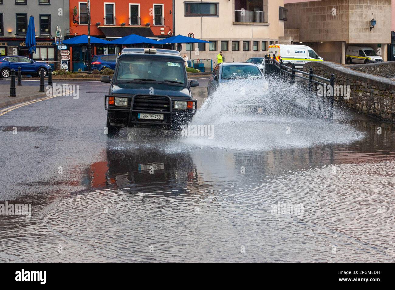 Bantry West Cork Ireland Thursday 23 Mar 2023; Bantry Experienced mild flooding this evening. High tide hit at 6.05pm with spot flooding in places. Cork County Council staff where out dealing with the major waterlogged areas as well as traffic managment. Credit; ED/Alamy Live News Stock Photo