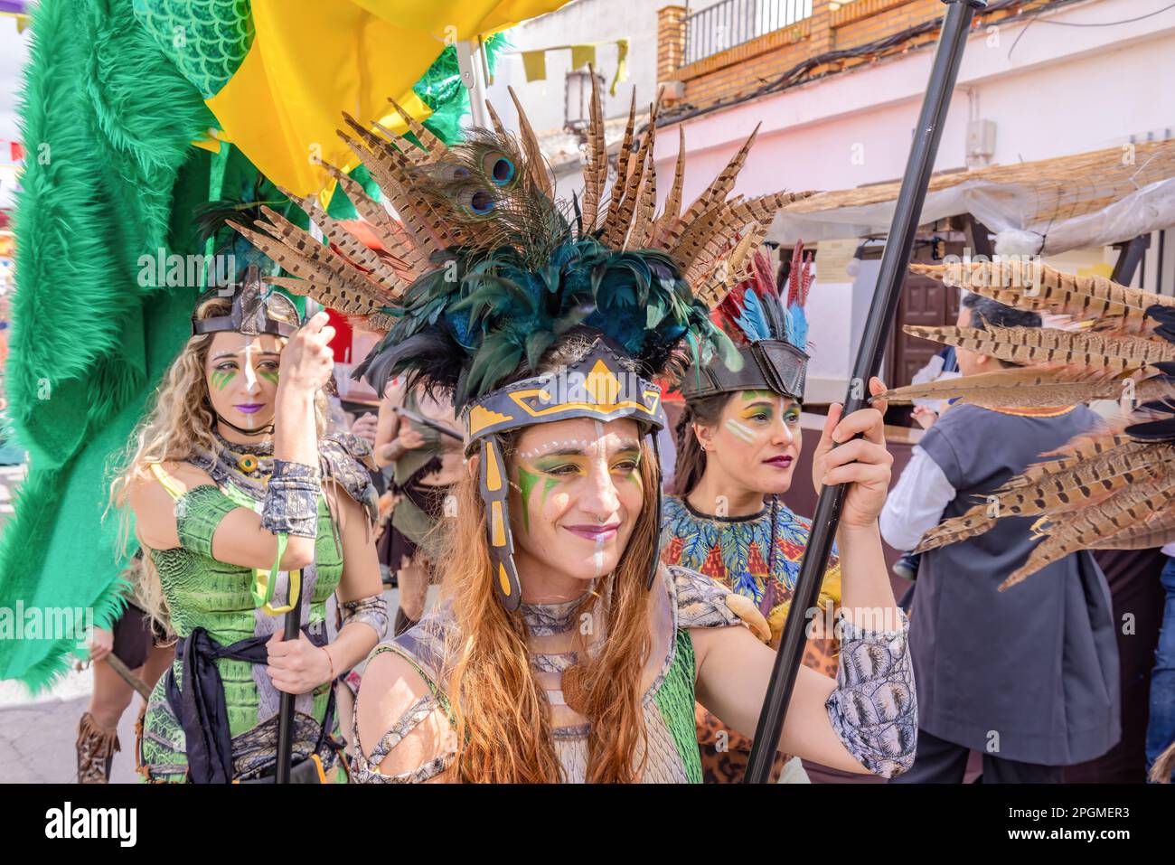 Huelva, Spain - March 18, 2023: Beautiful young woman dressed and made up in exotic period costume in the parade of Medieval Discovery Fair in Palos d Stock Photo