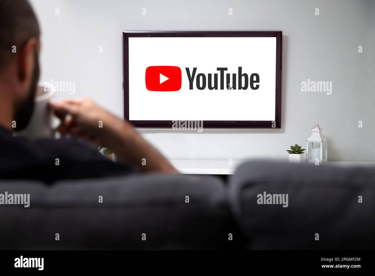 Man watching youtube video hi res stock photography and images Alamy