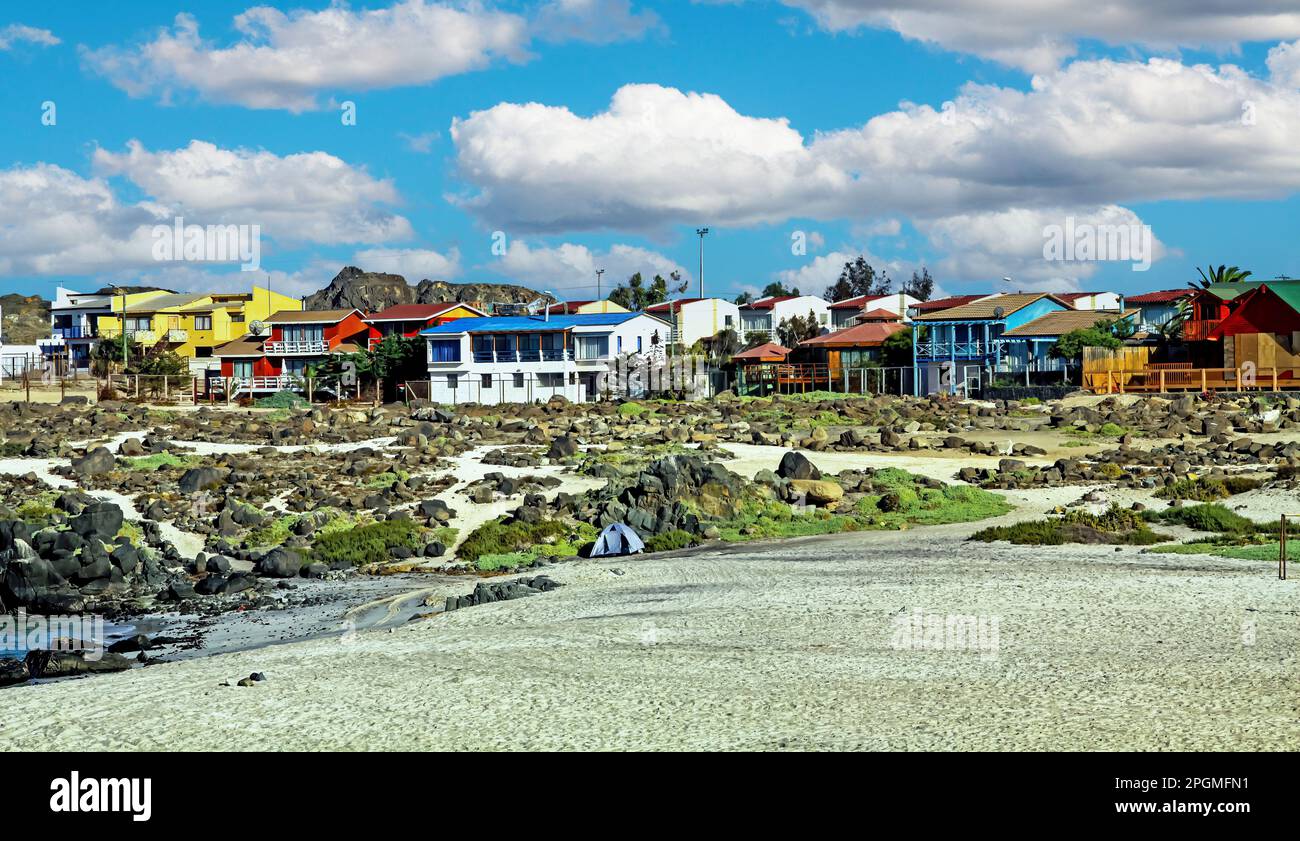 Typical colorful chilean colorful wooden beach houses in pacific coast