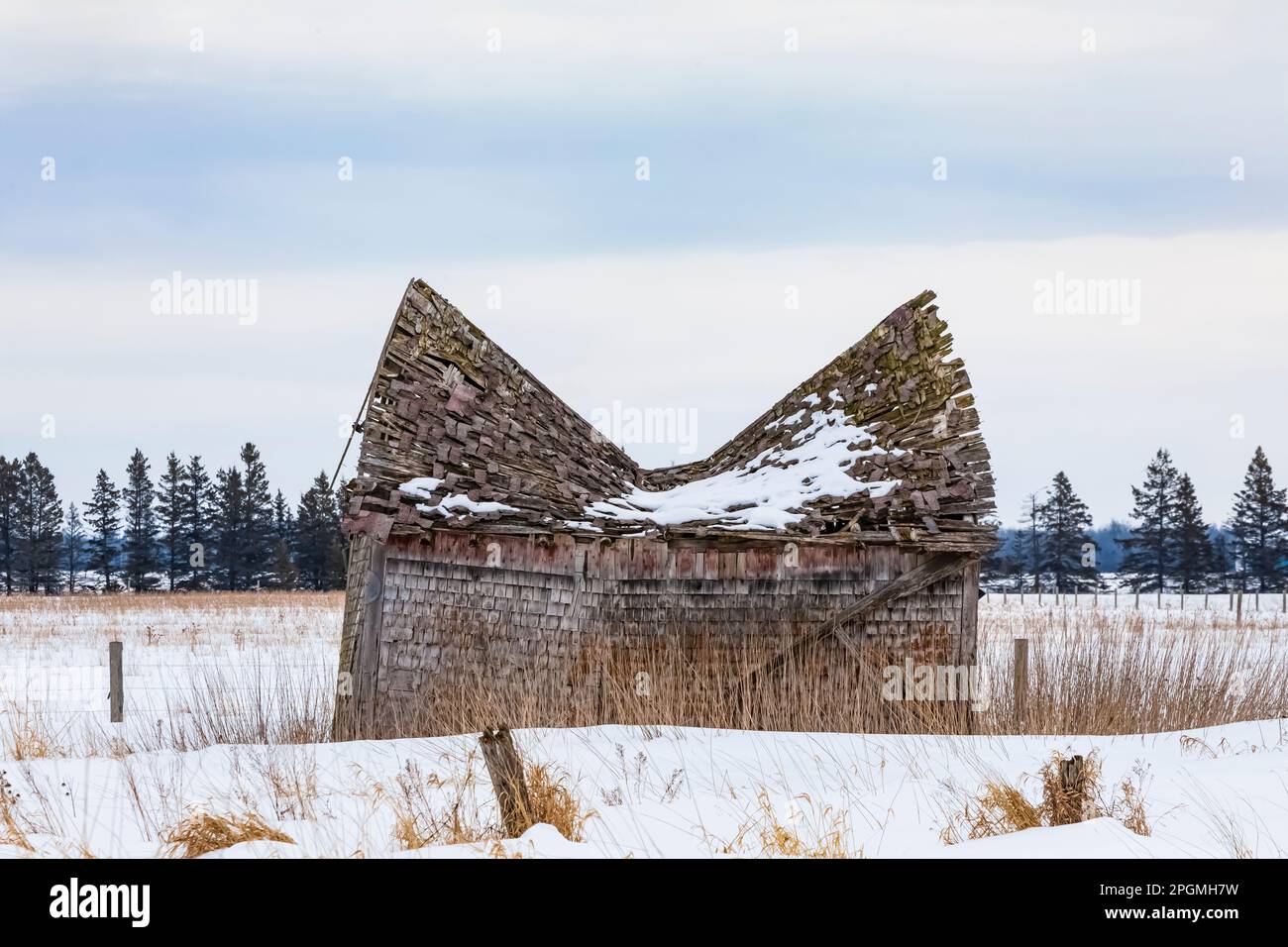 Barn with brokeback roof near Rudyard, Upper Peninsula, Michigan, USA [No property release; editorial licensing only] Stock Photo