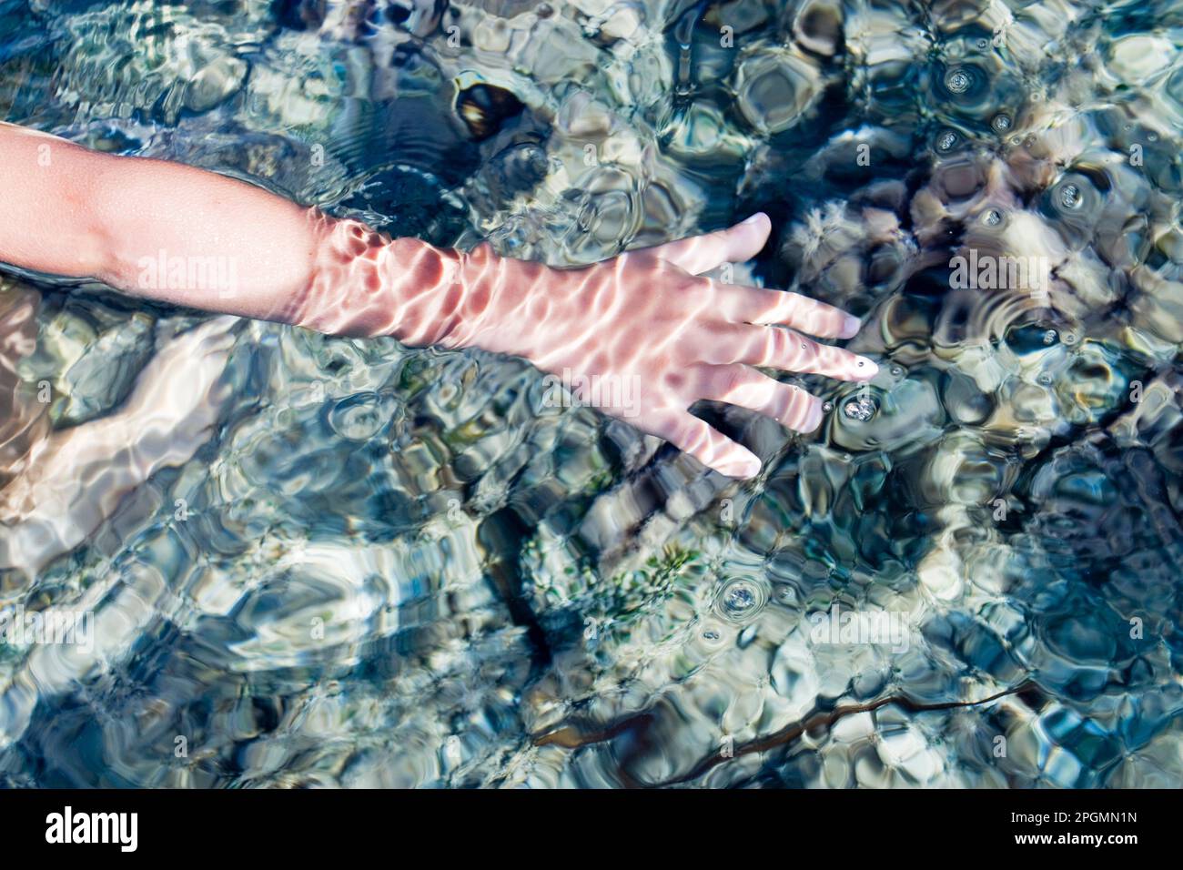 child's hand under water Stock Photo - Alamy