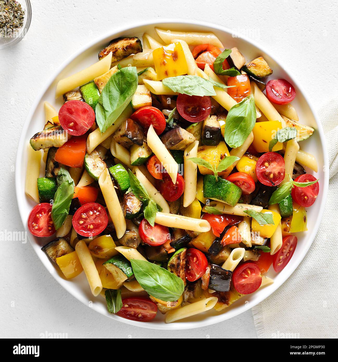 close-up-view-of-penne-pasta-salad-with-roasted-vegetables-on-plate