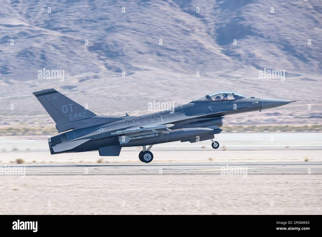 Las Vegas, NV - November 6, 2022: F-16 Fighter Jet Lands During a Demo at the Aviation Nation airshow at Nellis AFB. Stock Photo