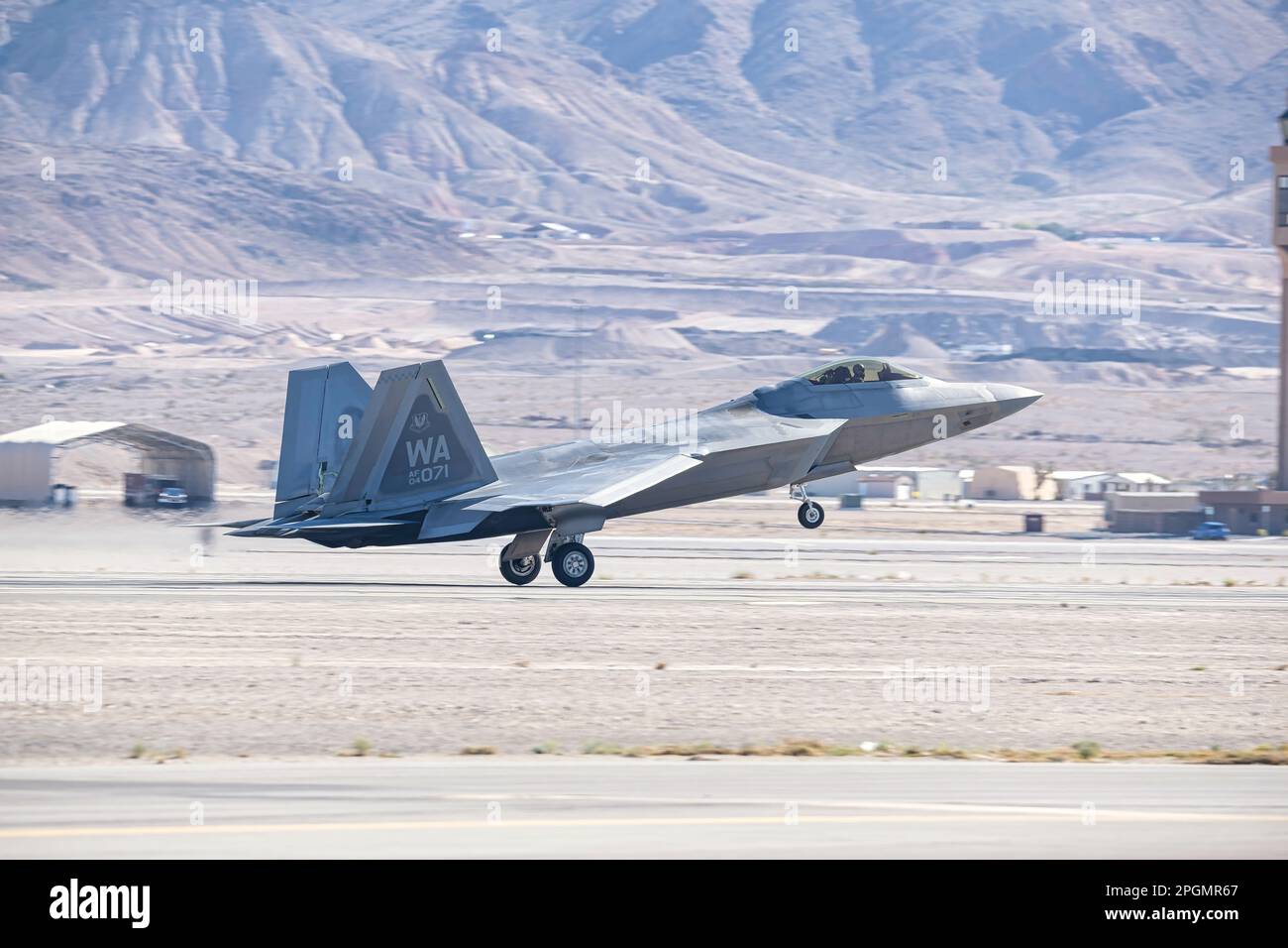 Las Vegas, NV - November 6, 2022: F-22 Fighter Jet Landing During the Aviation Nation Airshow at Nellis AFB. Stock Photo
