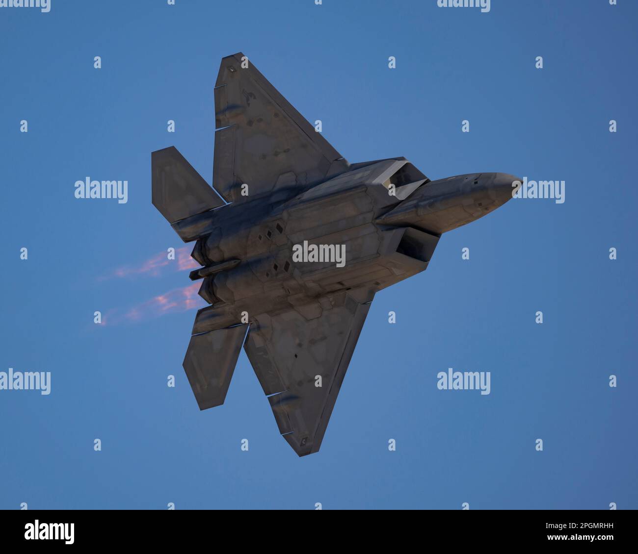 Las Vegas, NV - November 6, 2022: F-22 Fighter Jet With Afterburners During a Demonstration at the Aviation Nation Airshow at Nellis AFB. Stock Photo
