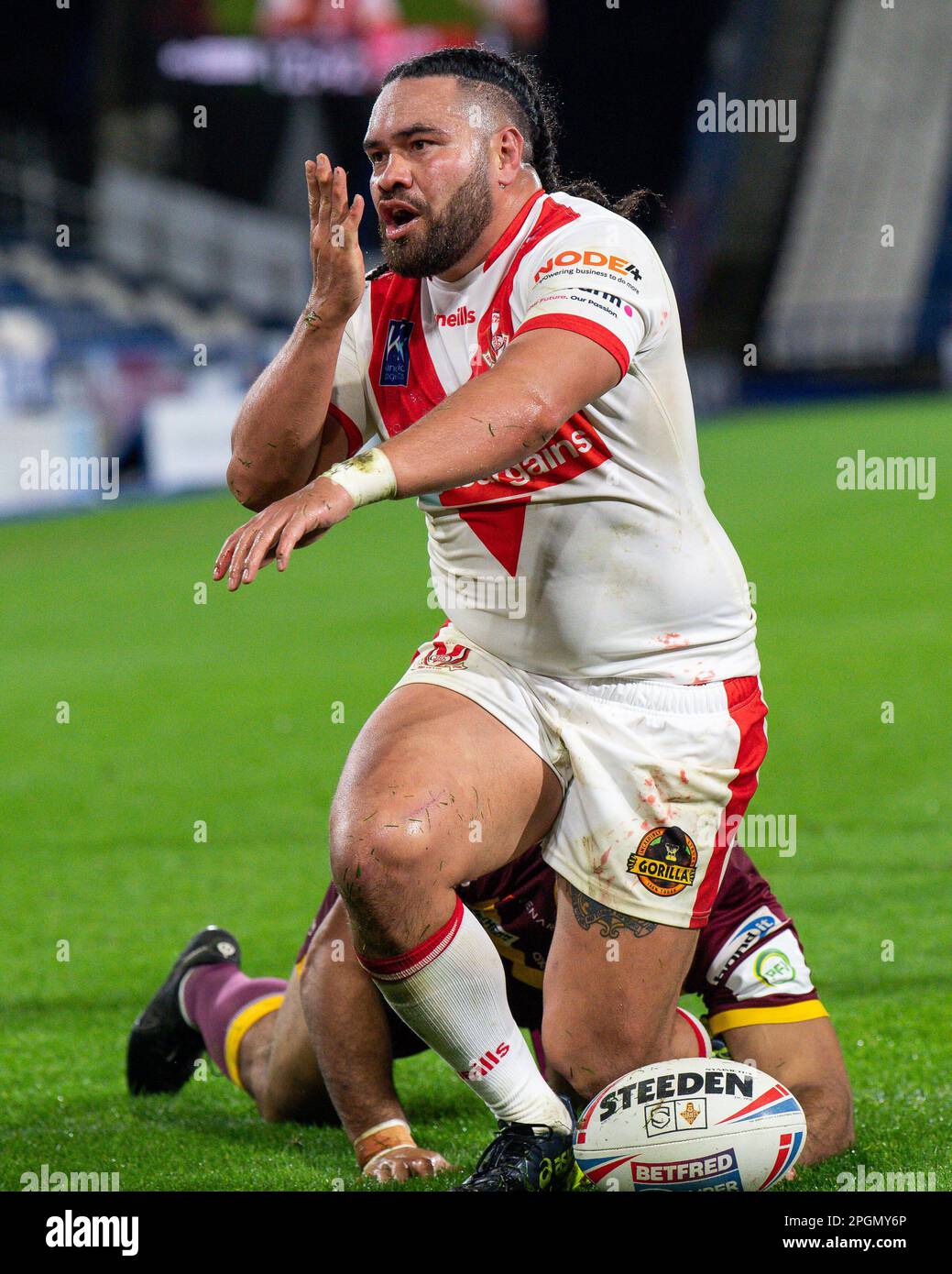 Konrad Hurrell #23 of St Helens celebrates his try by blowing a kiss uring the Betfred Super League Round 6 match Huddersfield Giants vs St Helens at John Smith's Stadium, Huddersfield, United Kingdom, 23rd March 2023  (Photo by Craig Thomas/News Images) Stock Photo