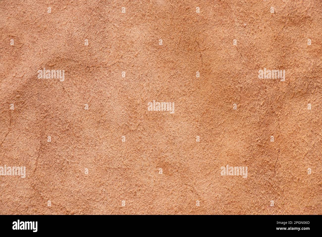 dark brown natural suede as a background close up Stock Photo