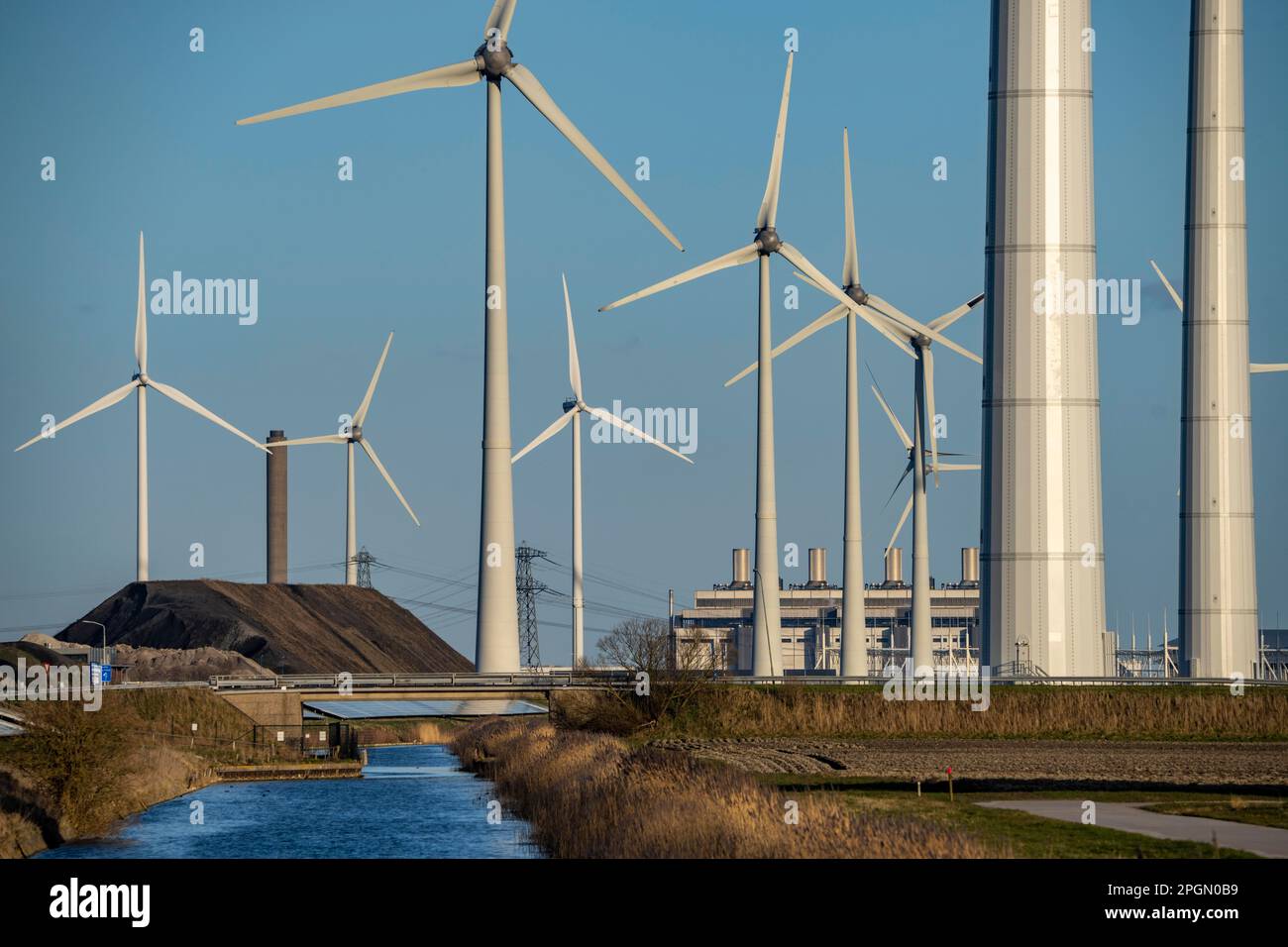 Eemshaven, wind farm, behind the Eemscentrale gas and steam power plant, Groningen, Netherlands, Stock Photo