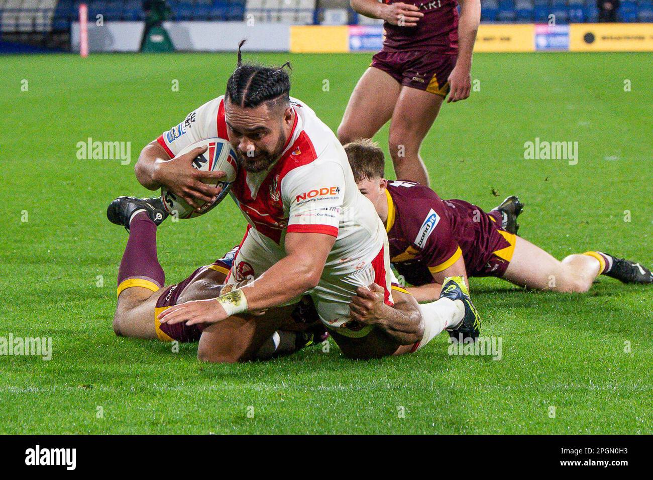 Konrad Hurrell #23 of St Helens goes over for a try during the Betfred Super League Round 6 match Huddersfield Giants vs St Helens at John Smith's Stadium, Huddersfield, United Kingdom, 23rd March 2023  (Photo by Craig Thomas/News Images) Stock Photo