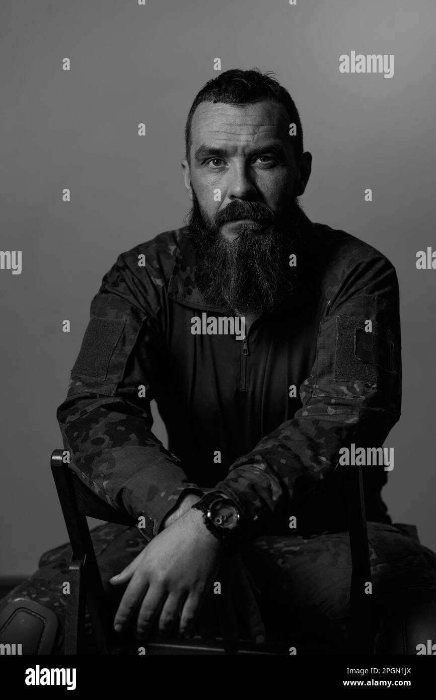 Black and white portrait of a 40-year-old bearded soldier Stock Photo