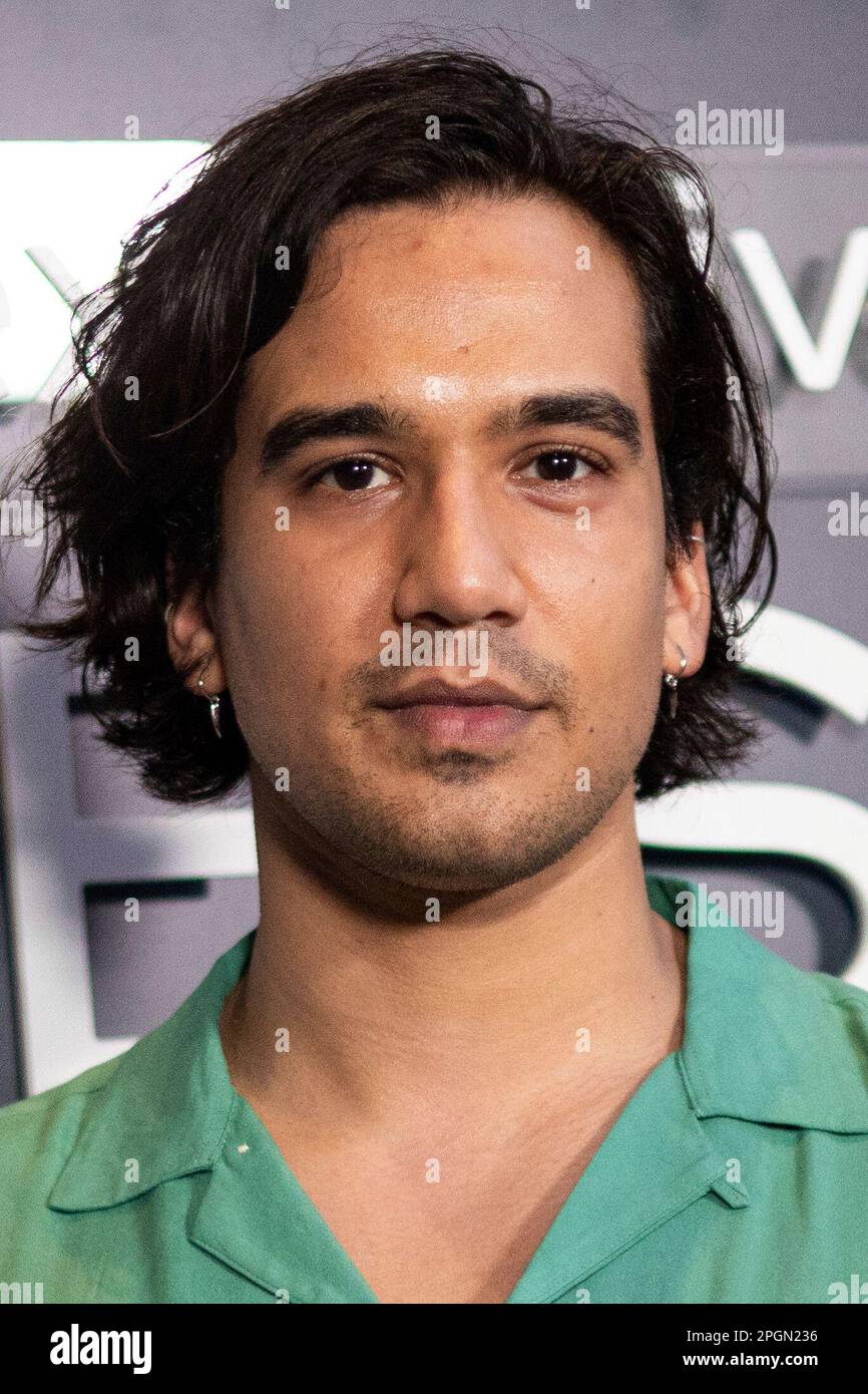 Nathaniel Curtis poses for photographers upon arrival at the premiere