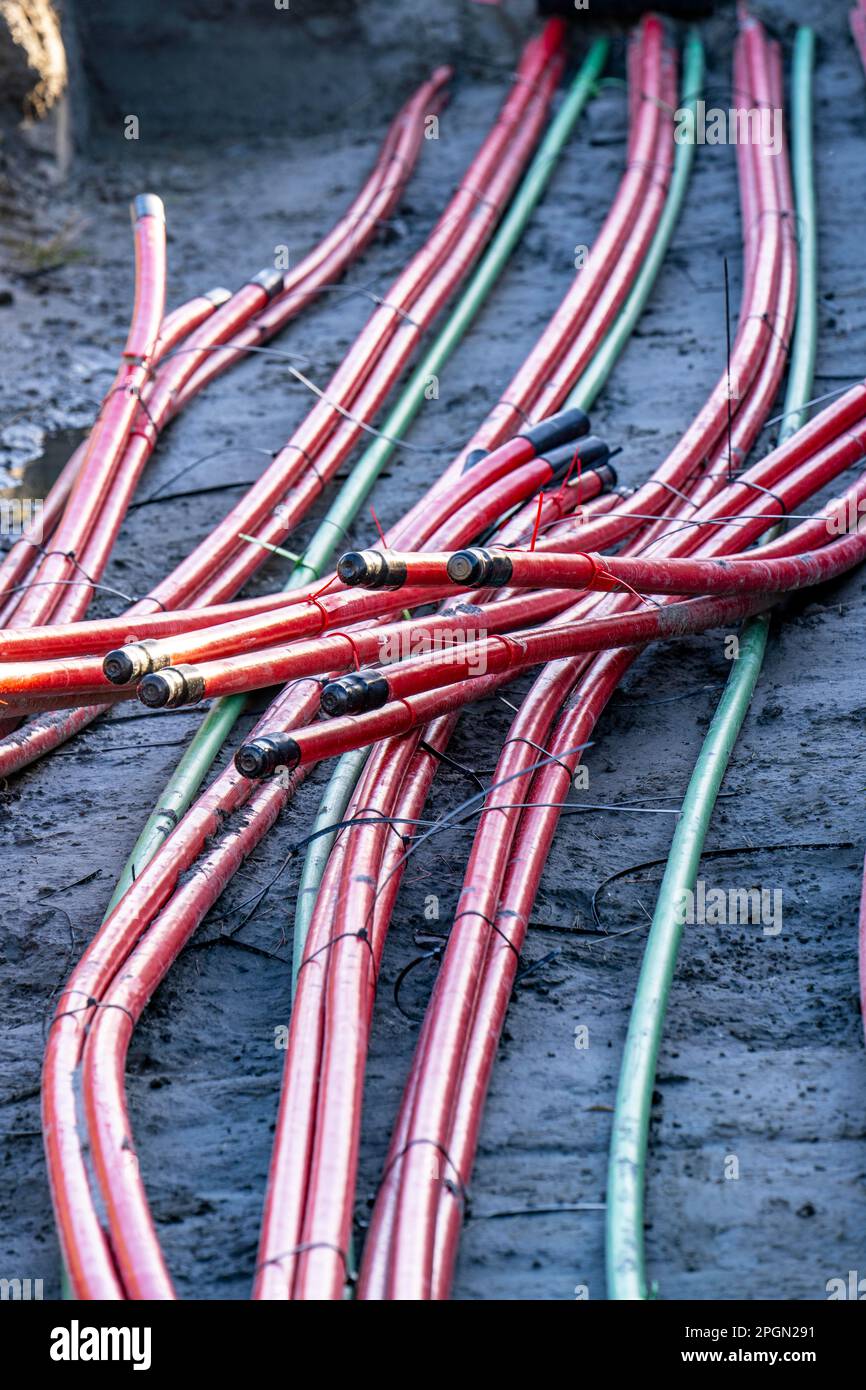 Power lines, underground cable strings transporting energy from wind turbines to central