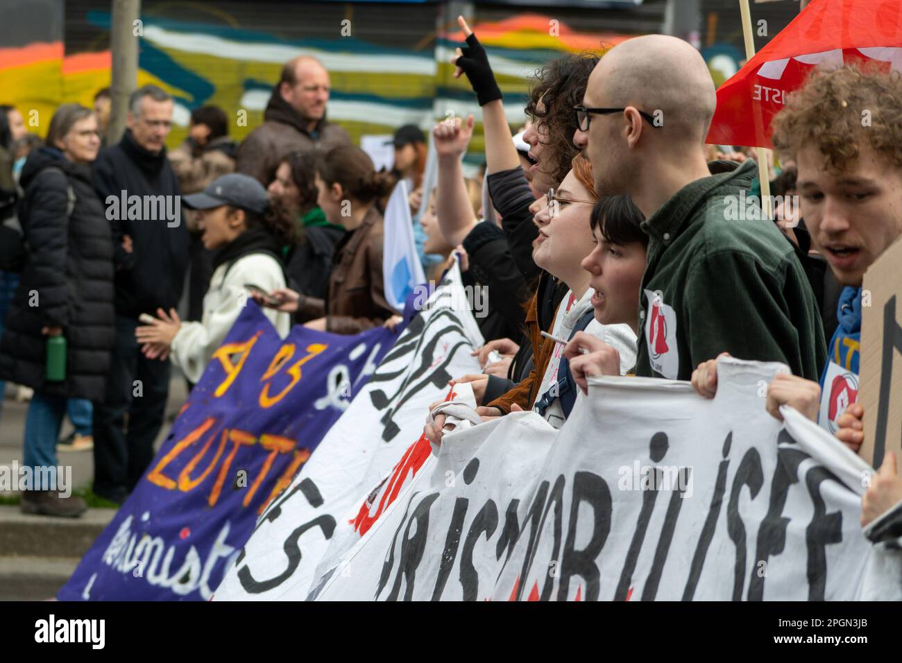 Paris, France, 23th March, 2023. Young people protest with banner against pension reform - Jacques Julien/Alamy Live News Stock Photo