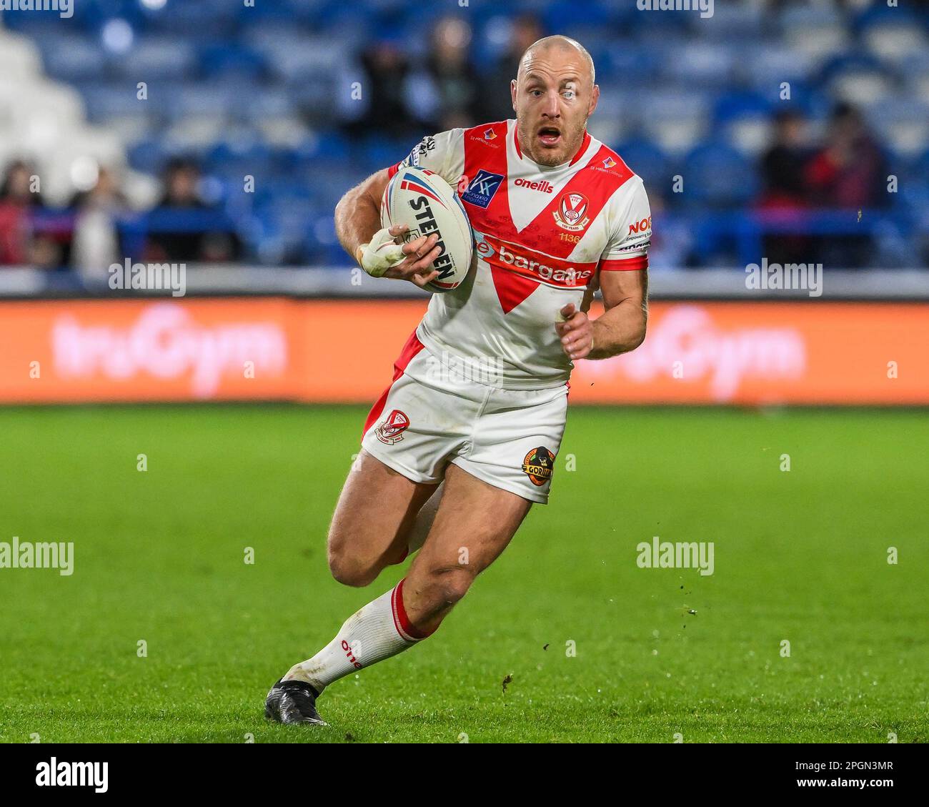 James Roby #9 of St Helens makes a break during the Betfred Super League Round 6 match Huddersfield Giants vs St Helens at John Smith's Stadium, Huddersfield, United Kingdom, 23rd March 2023  (Photo by Craig Thomas/News Images) Stock Photo