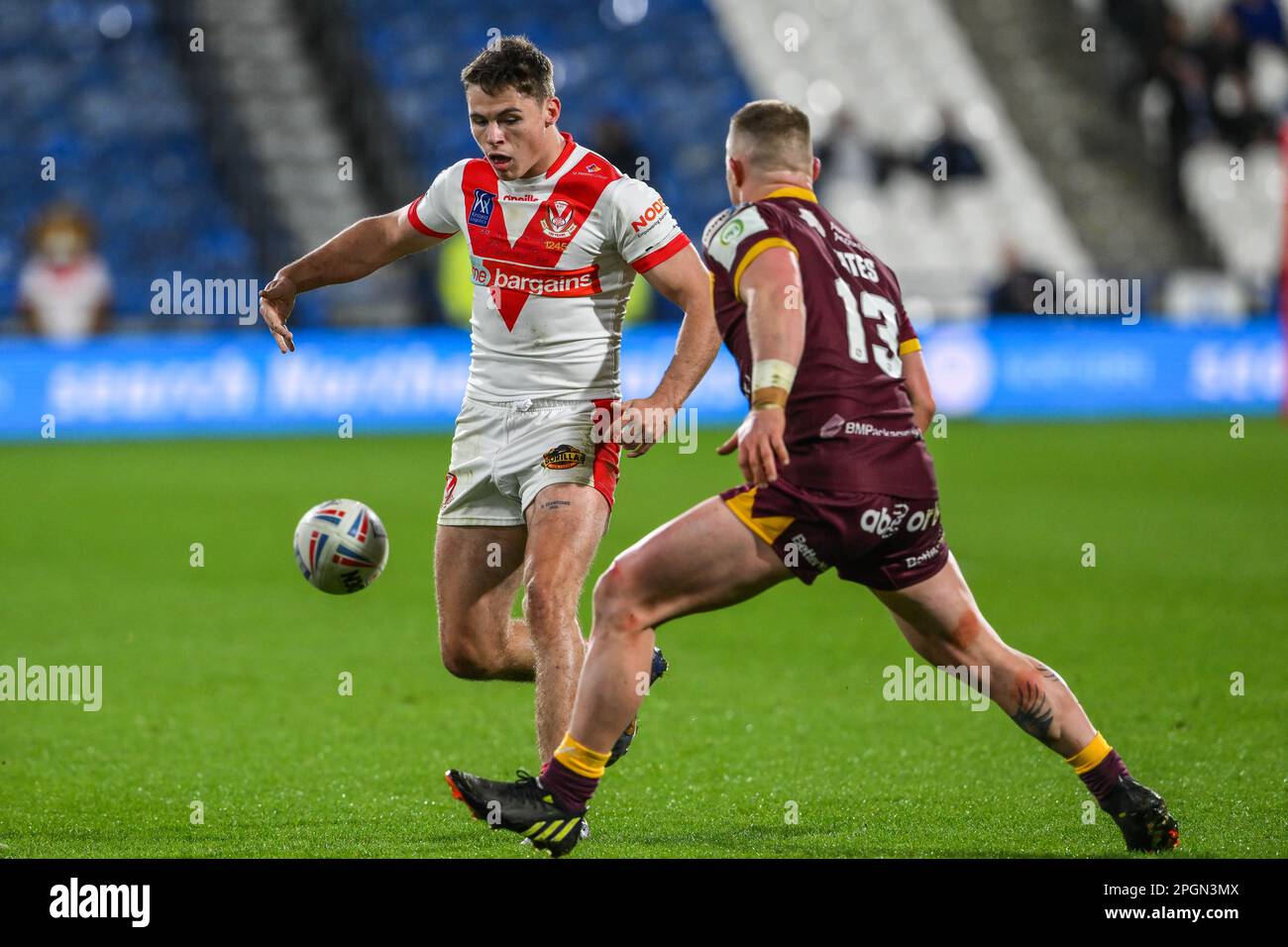 Jack Welsby #1 of St Helens chips ahead during the Betfred Super League Round 6 match Huddersfield Giants vs St Helens at John Smith's Stadium, Huddersfield, United Kingdom, 23rd March 2023  (Photo by Craig Thomas/News Images) Stock Photo