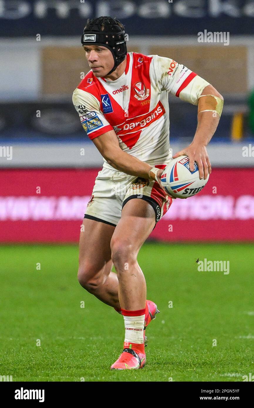 Jonny Lomax #6 of St Helens makes a break during the Betfred Super League Round 6 match Huddersfield Giants vs St Helens at John Smith's Stadium, Huddersfield, United Kingdom, 23rd March 2023  (Photo by Craig Thomas/News Images) Stock Photo