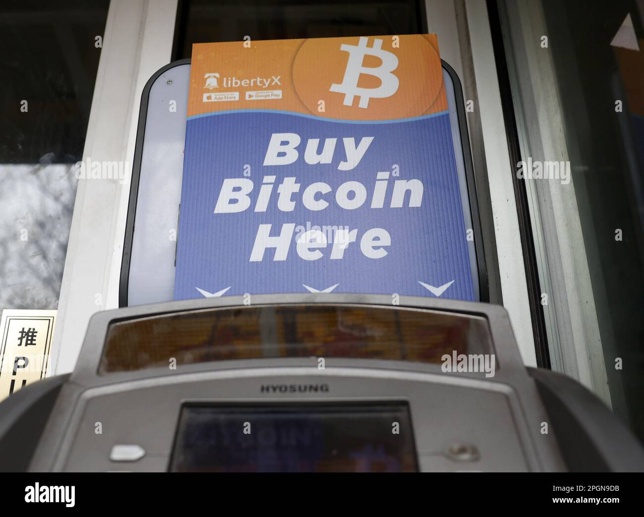 New York, United States. 23rd Mar, 2023. A cash bank machine displays a  sign to buy Bitcoin here in the Chinatown section of New York City on  Thursday, March 23, 2023. Photo