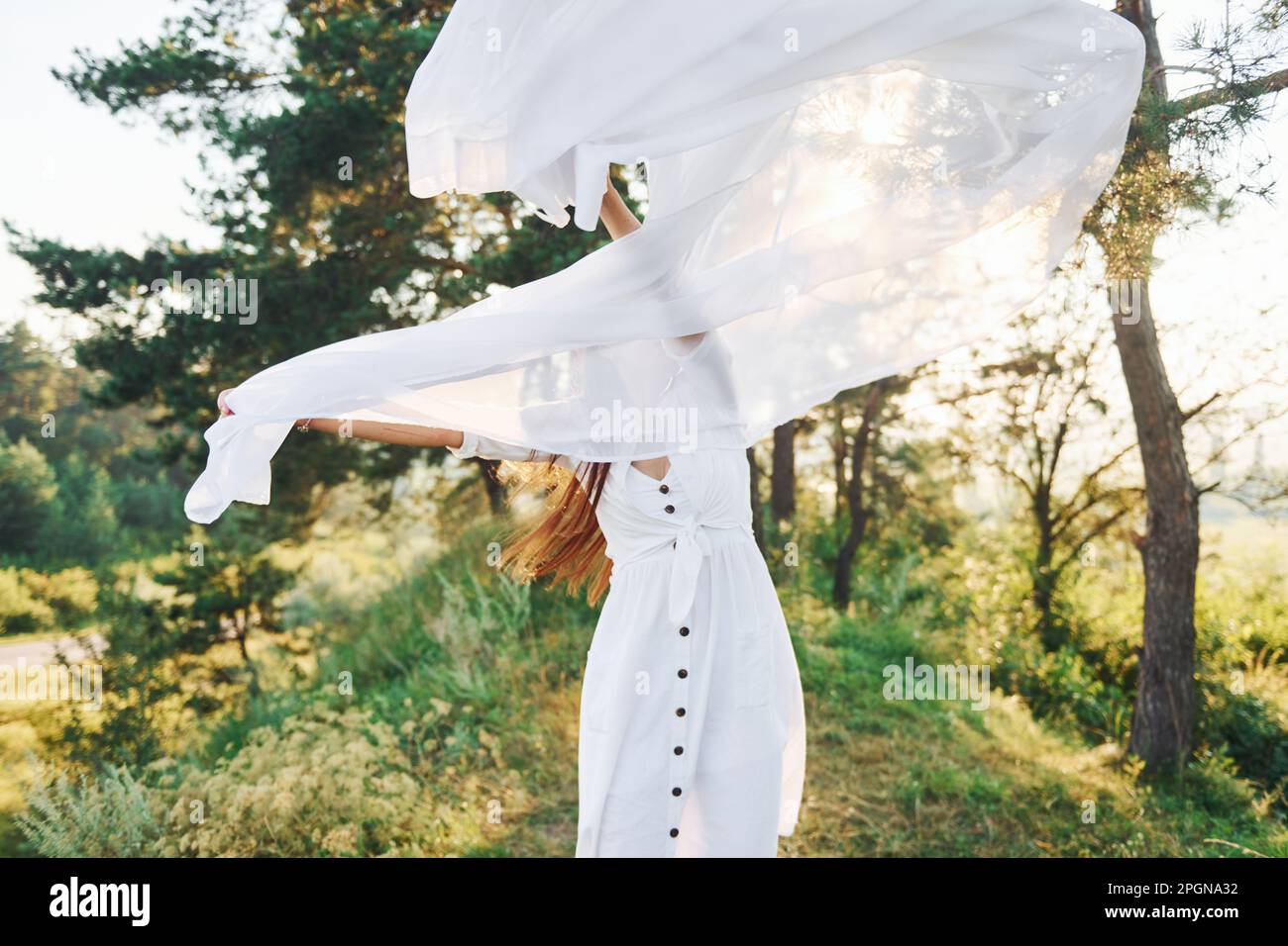 Young woman dancing in woods hi-res stock photography and images - Alamy