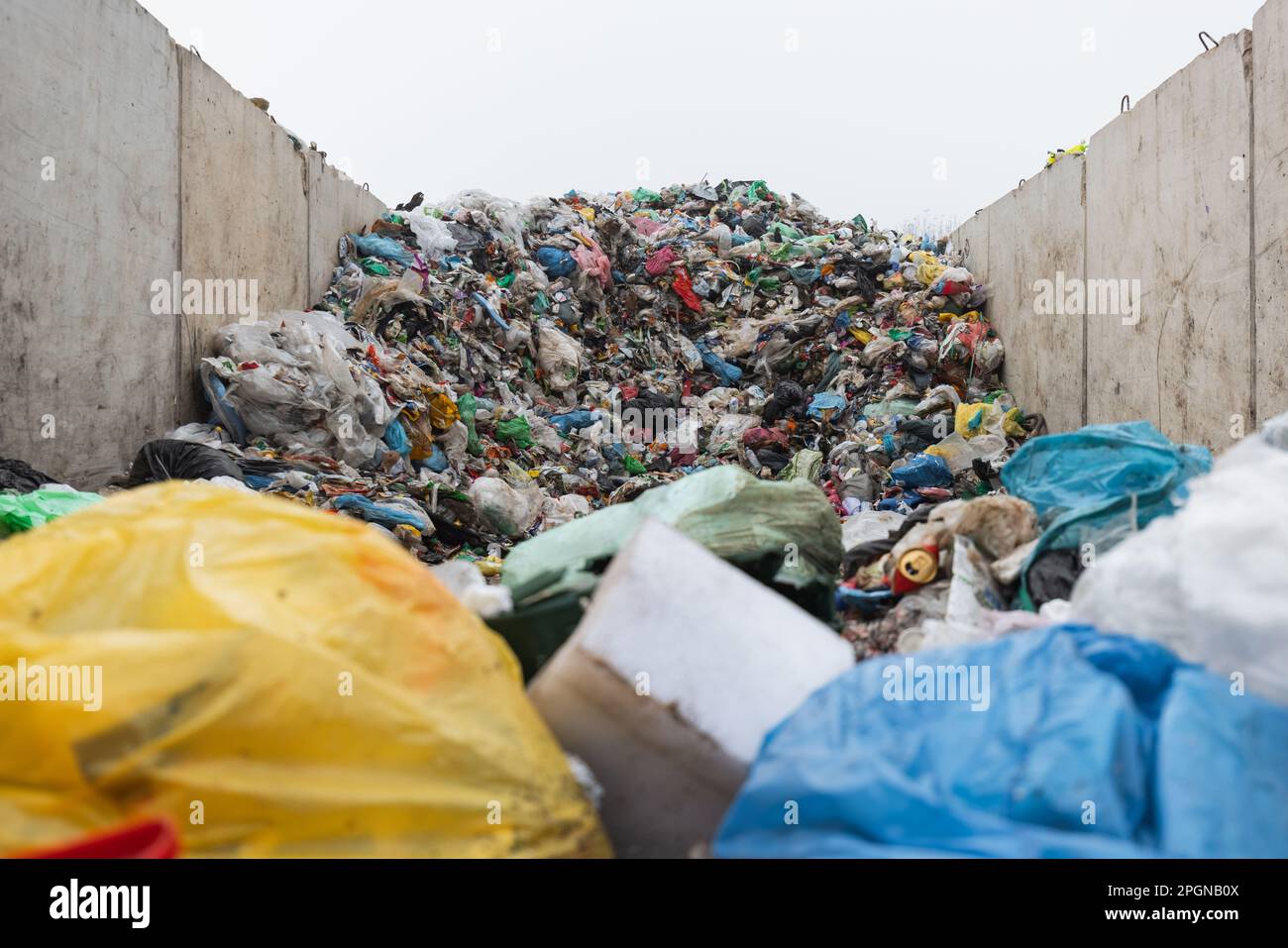 Landfill with trash and garbage polluting environment waiting to